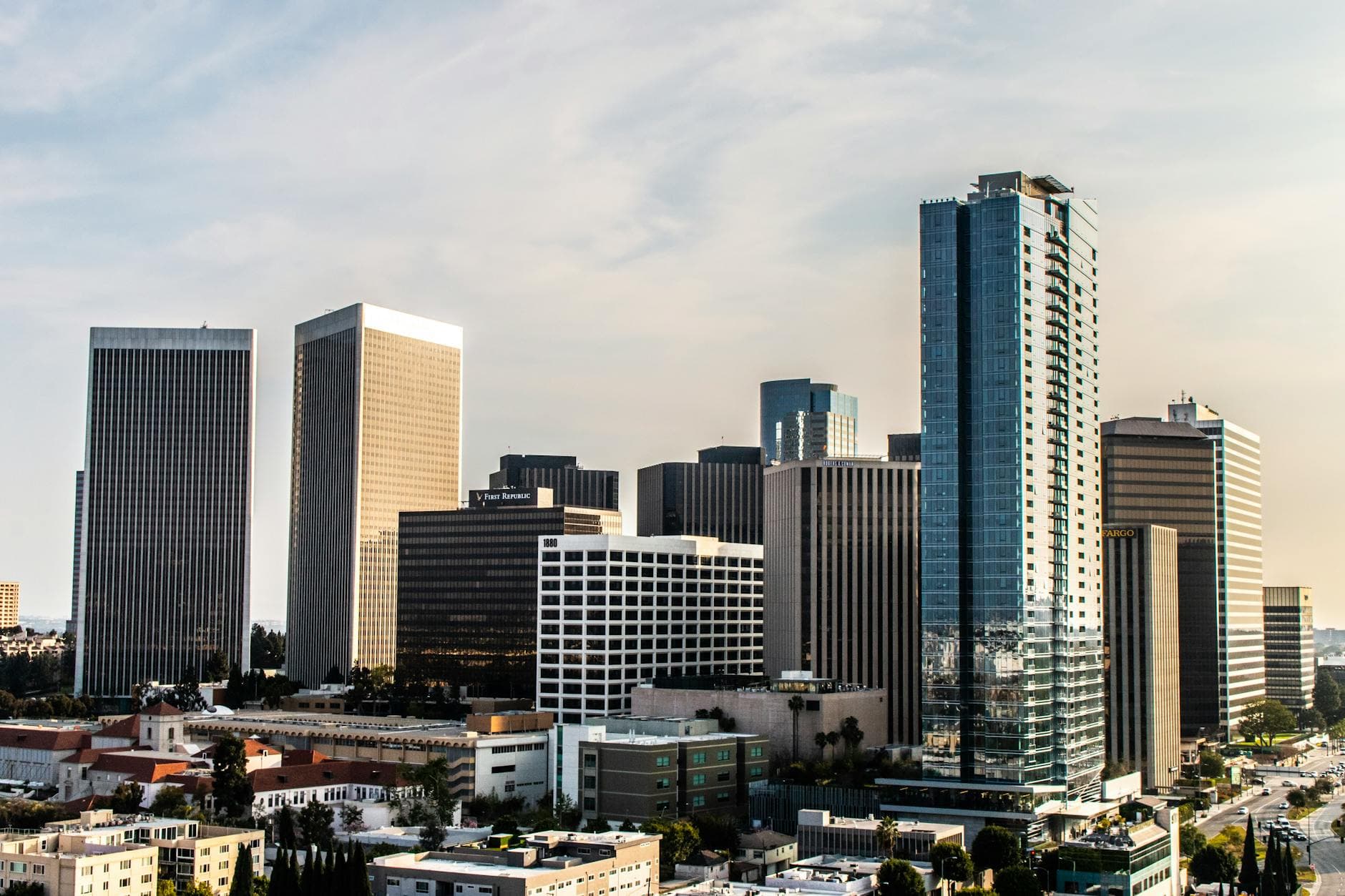 A modern cityscape of Beverly Hills featuring towering skyscrapers and contemporary architecture.