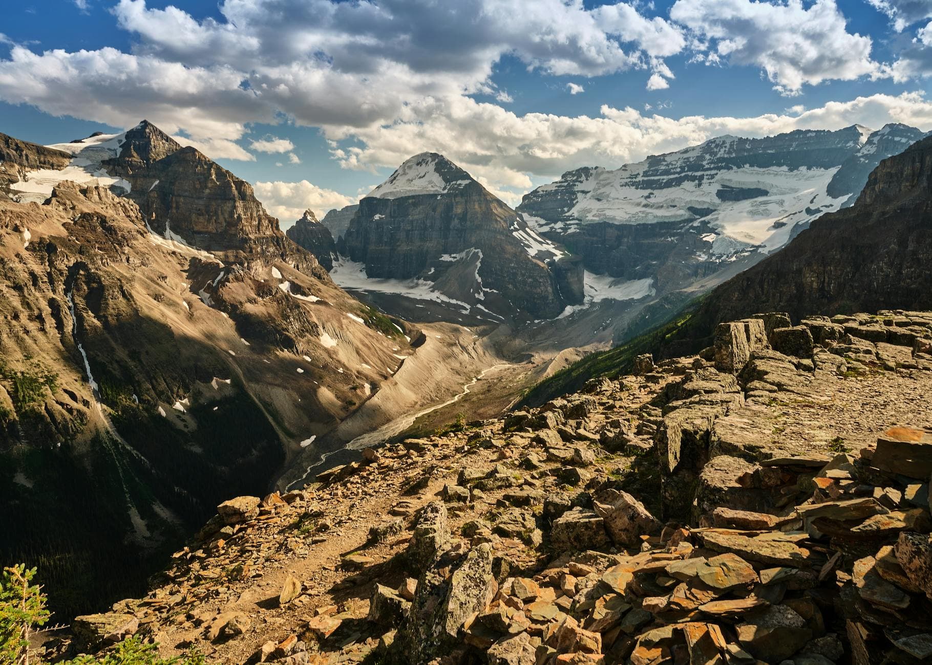 Breathtaking view of the Rocky Mountains with snow-capped peaks and a scenic landscape in Alberta, Canada.