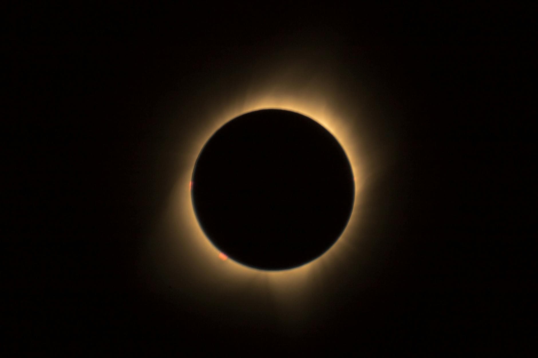 A captivating view of a solar eclipse highlighting the glowing corona in a dark sky.