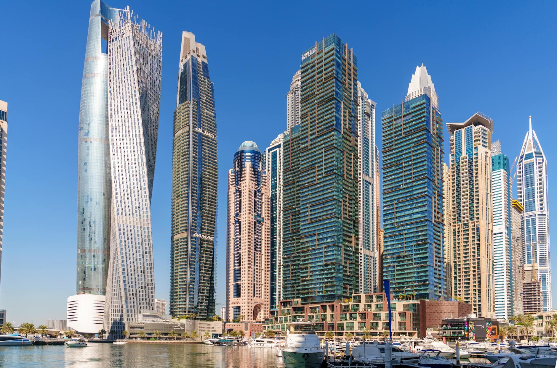 Stunning view of skyscrapers lining Dubai Marina during the day, showcasing modern architecture.