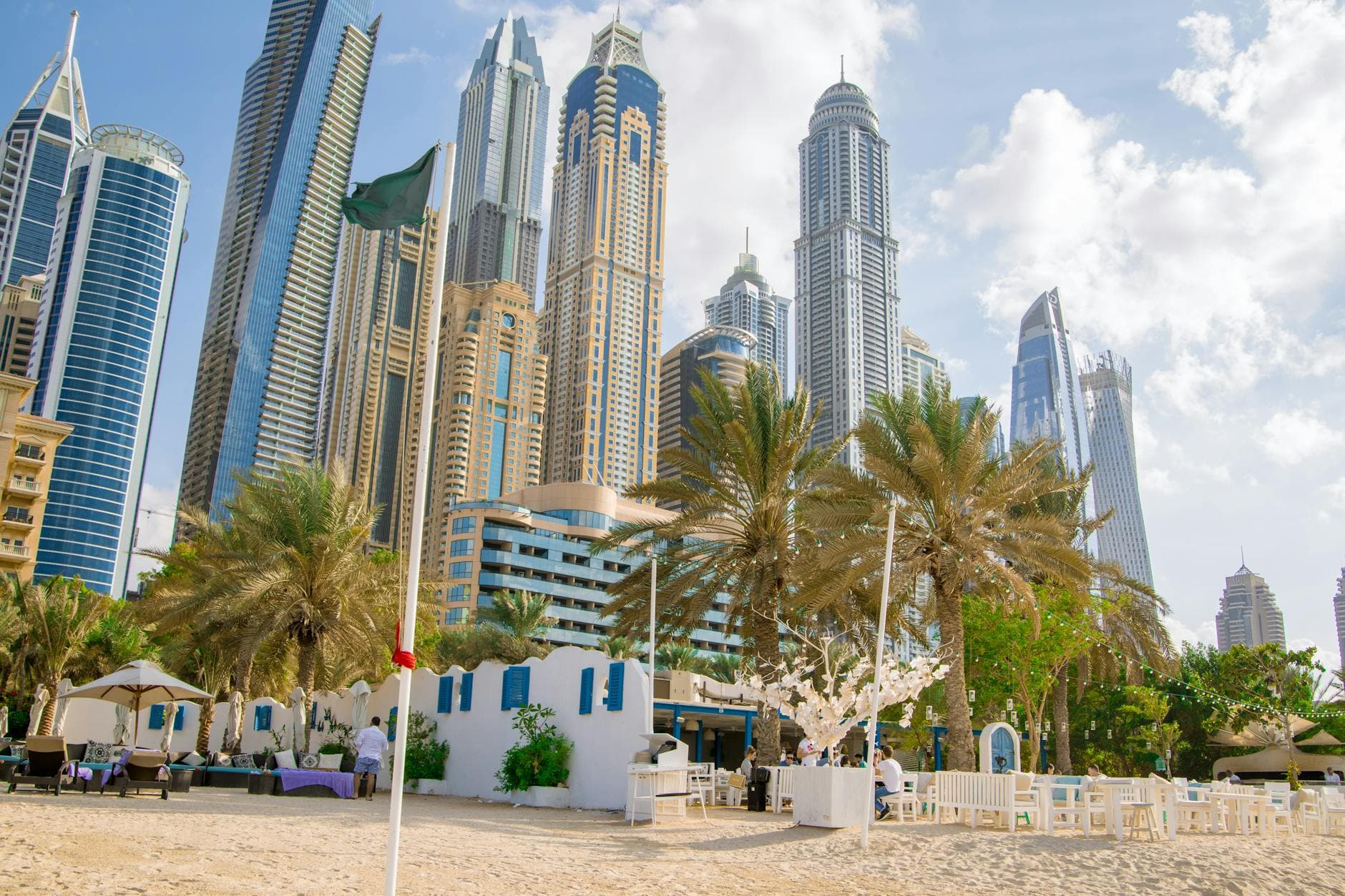 Coastal view of modern skyscrapers and beach setting in Dubai, UAE.