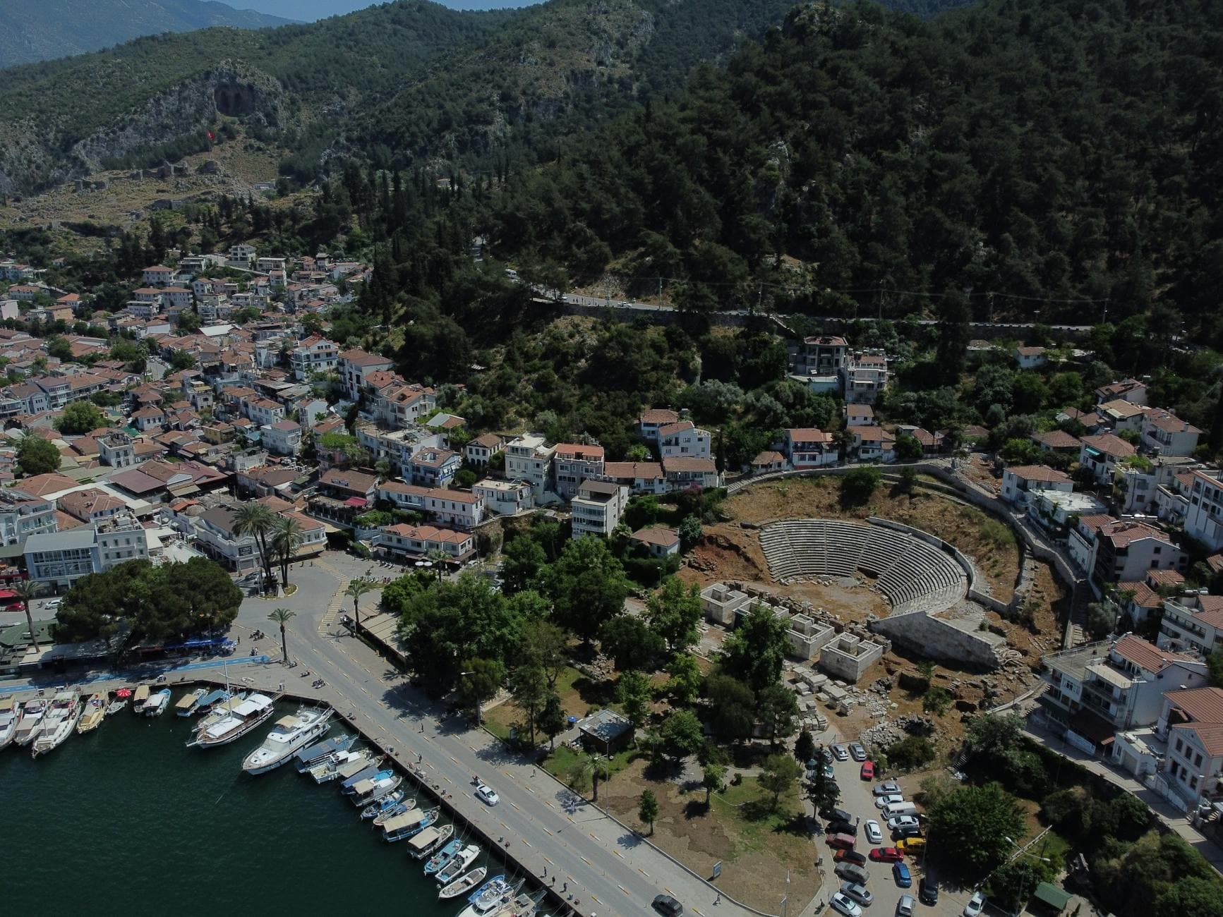 Stunning aerial view of Fethiye's coast and ancient amphitheater in Muğla, Turkey.