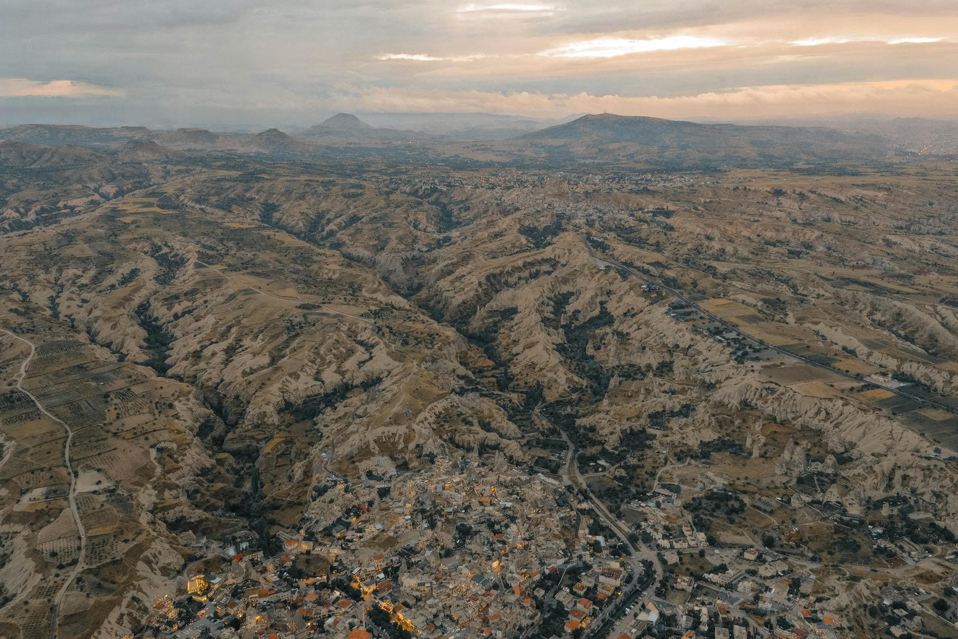 Stunning aerial landscape of Göreme National Park, Cappadocia at twilight.