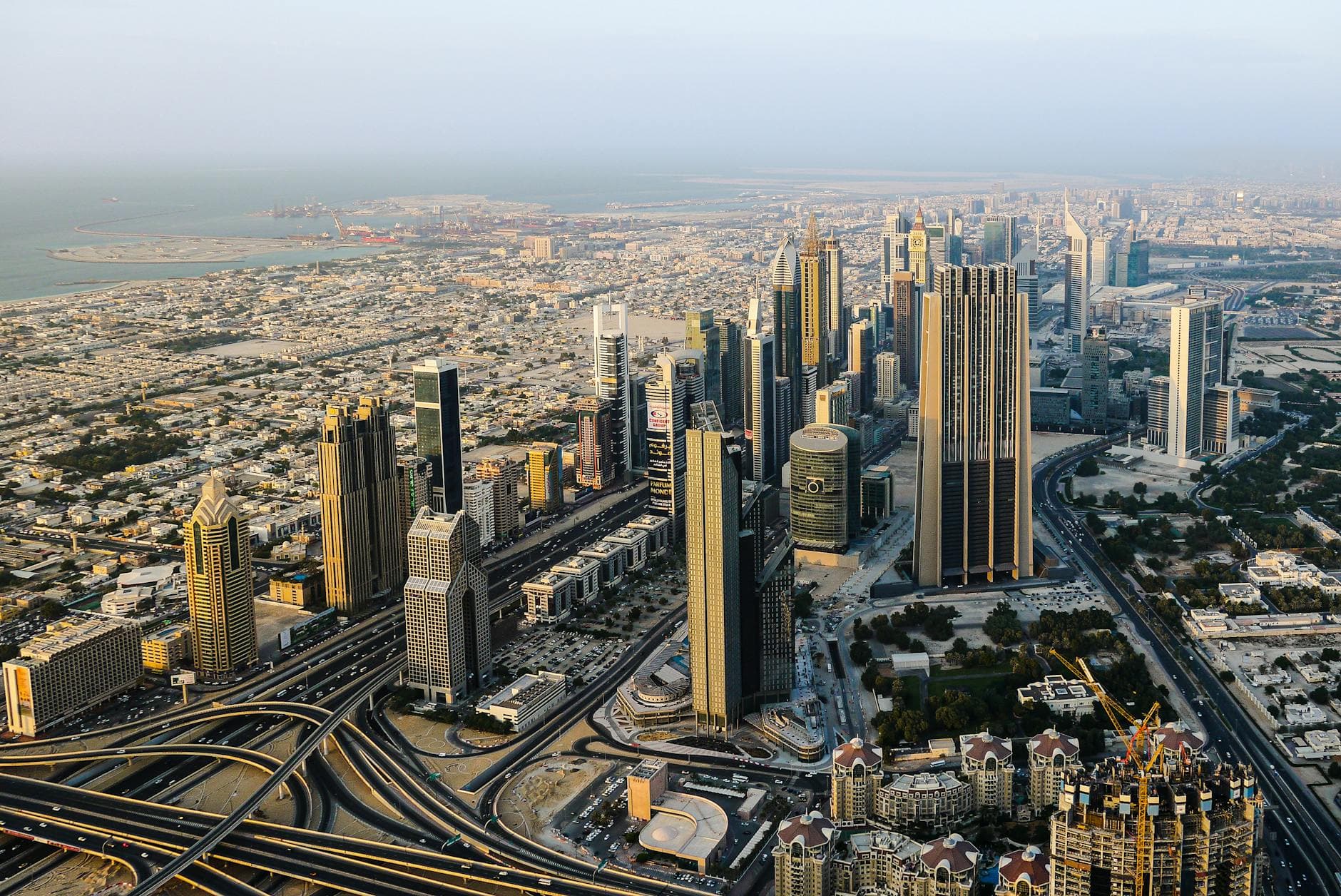 Breathtaking aerial view of modern skyscrapers in Dubai's bustling cityscape.