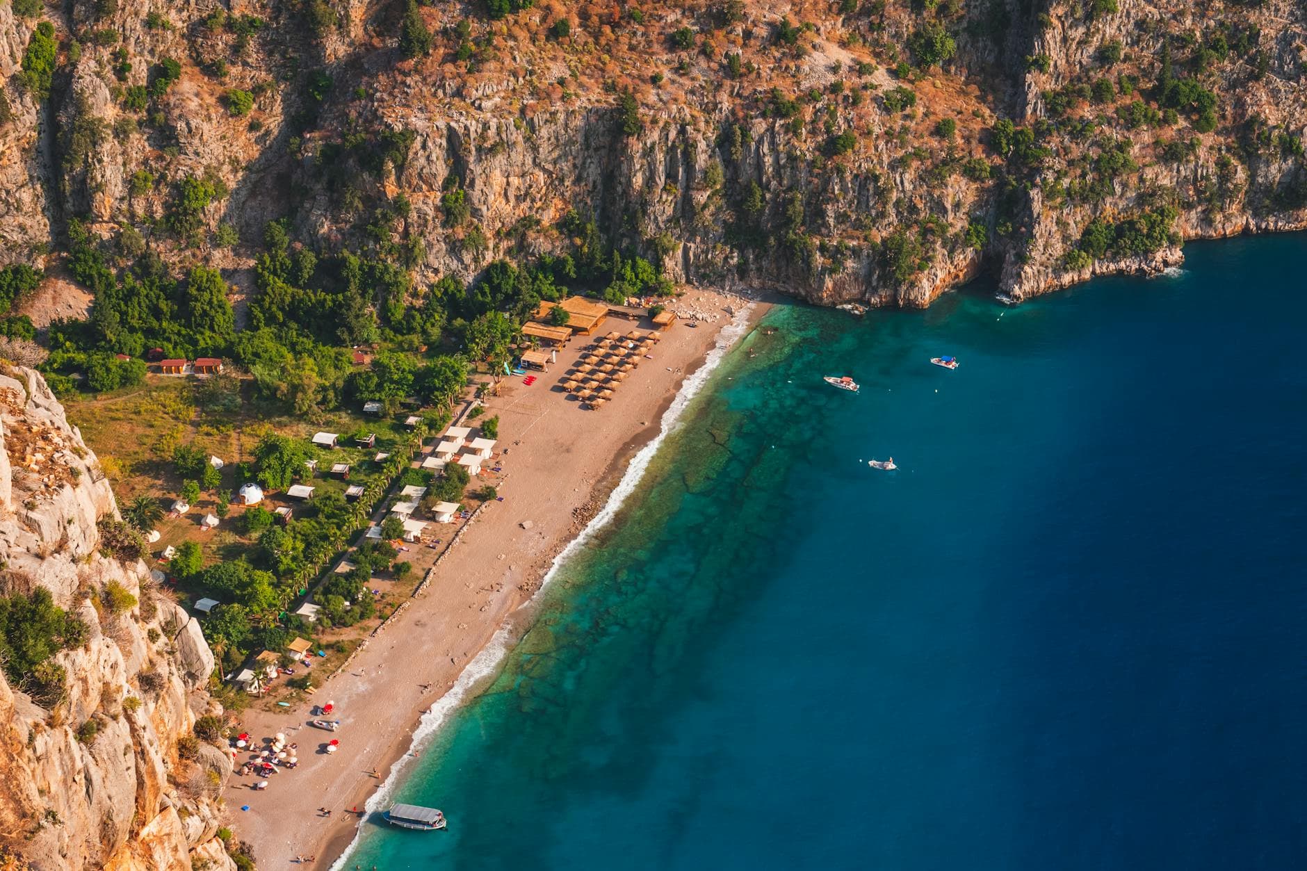 Stunning aerial photo of Kabak Beach, Muğla, with turquoise water and sandy coastline.