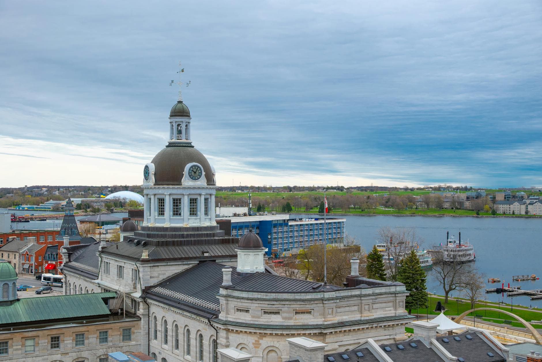 A captivating view of Kingston City Hall against a dramatic sky, overlooking the waterfront.