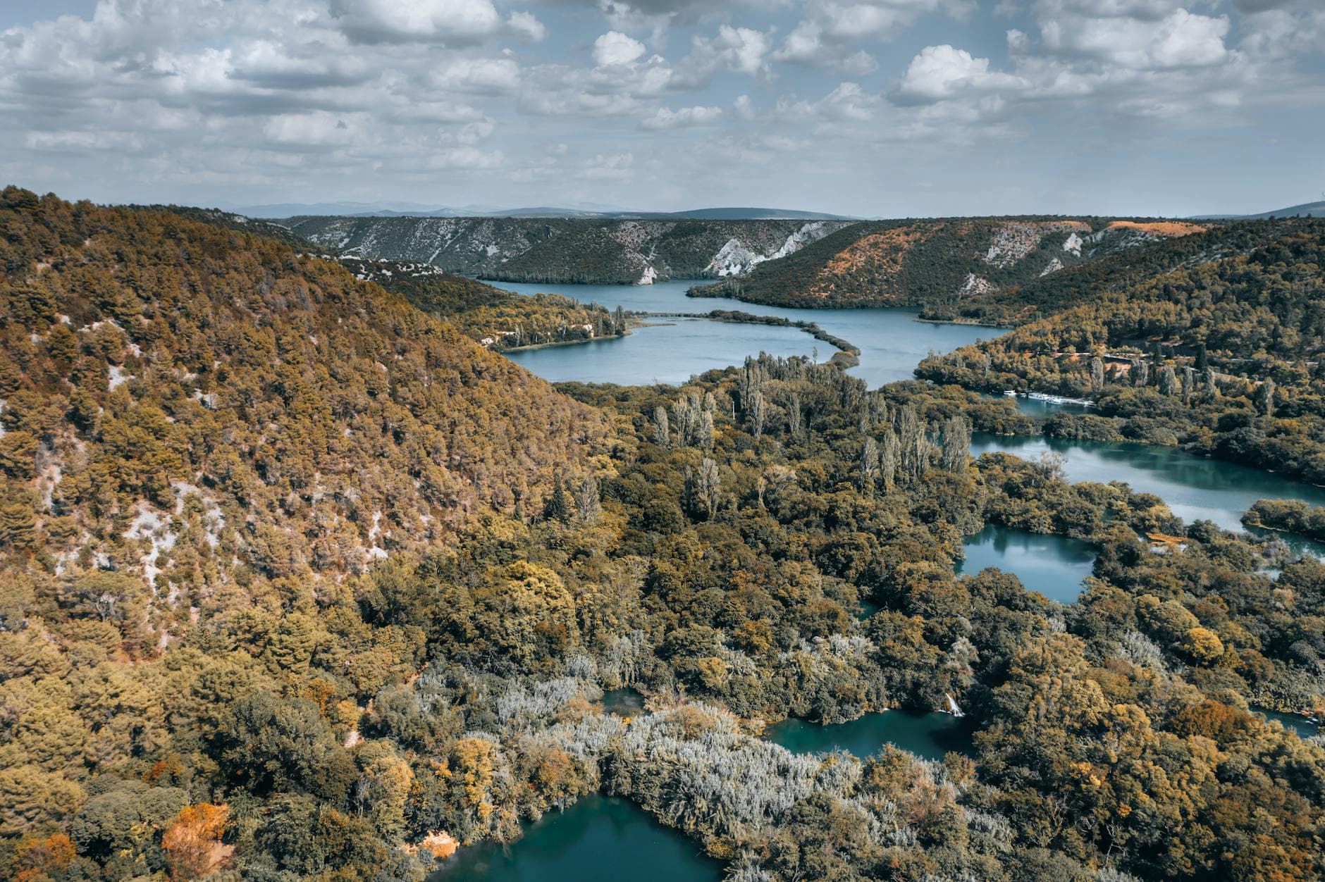 Stunning aerial view of Krka National Park's lakes and forests in Croatia.