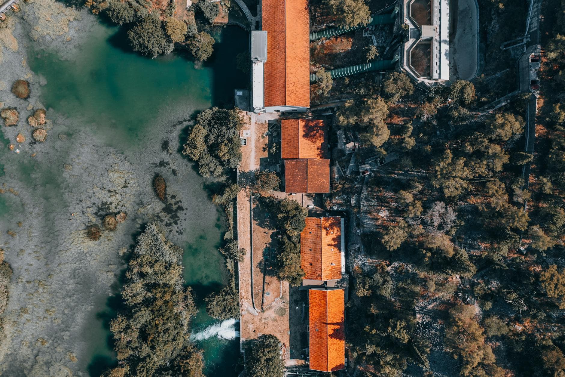 Stunning aerial shot of Krka River's scenic shoreline in Croatia's summer setting.
