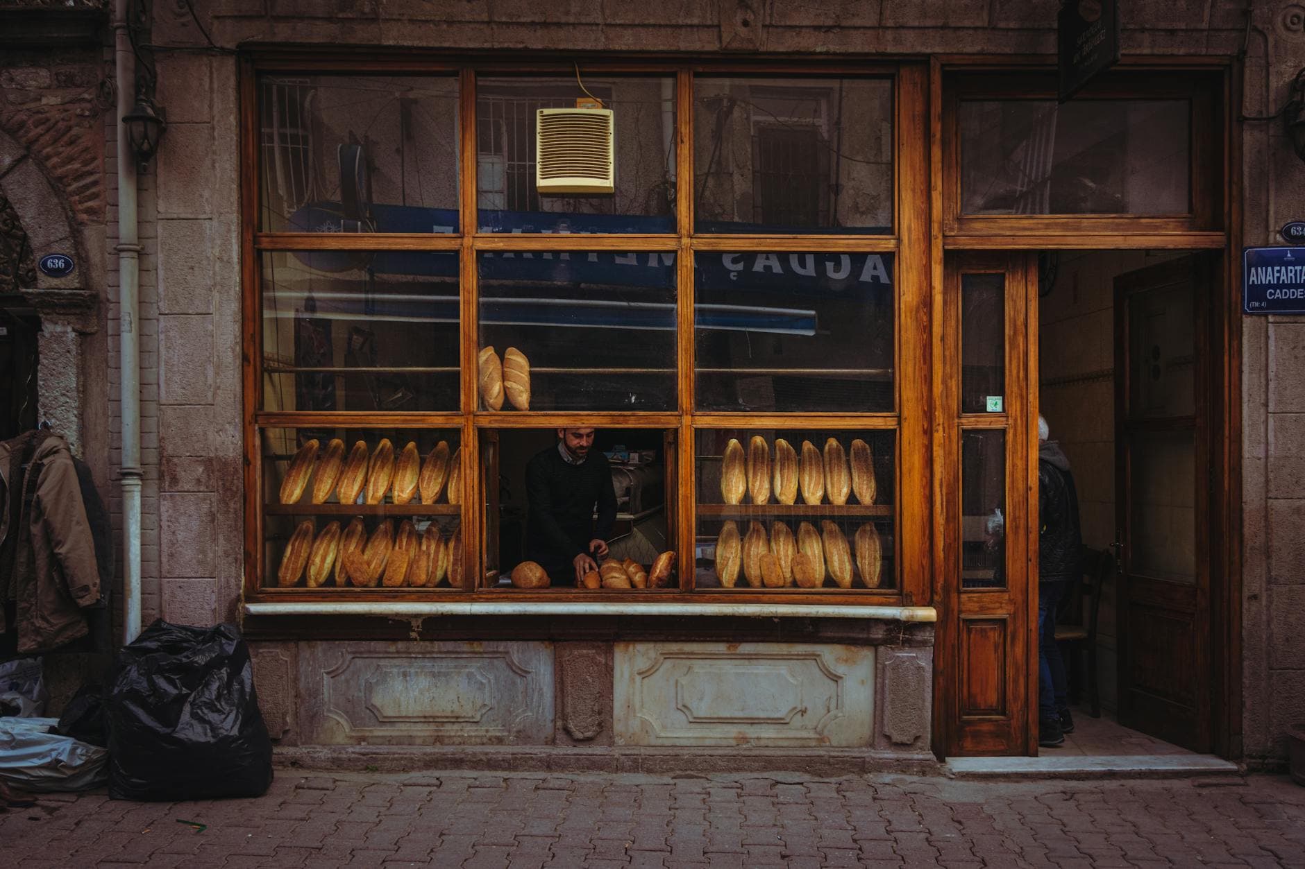 Charming street view of a bakery in Izmir, Turkey, showcasing artisanal bread.