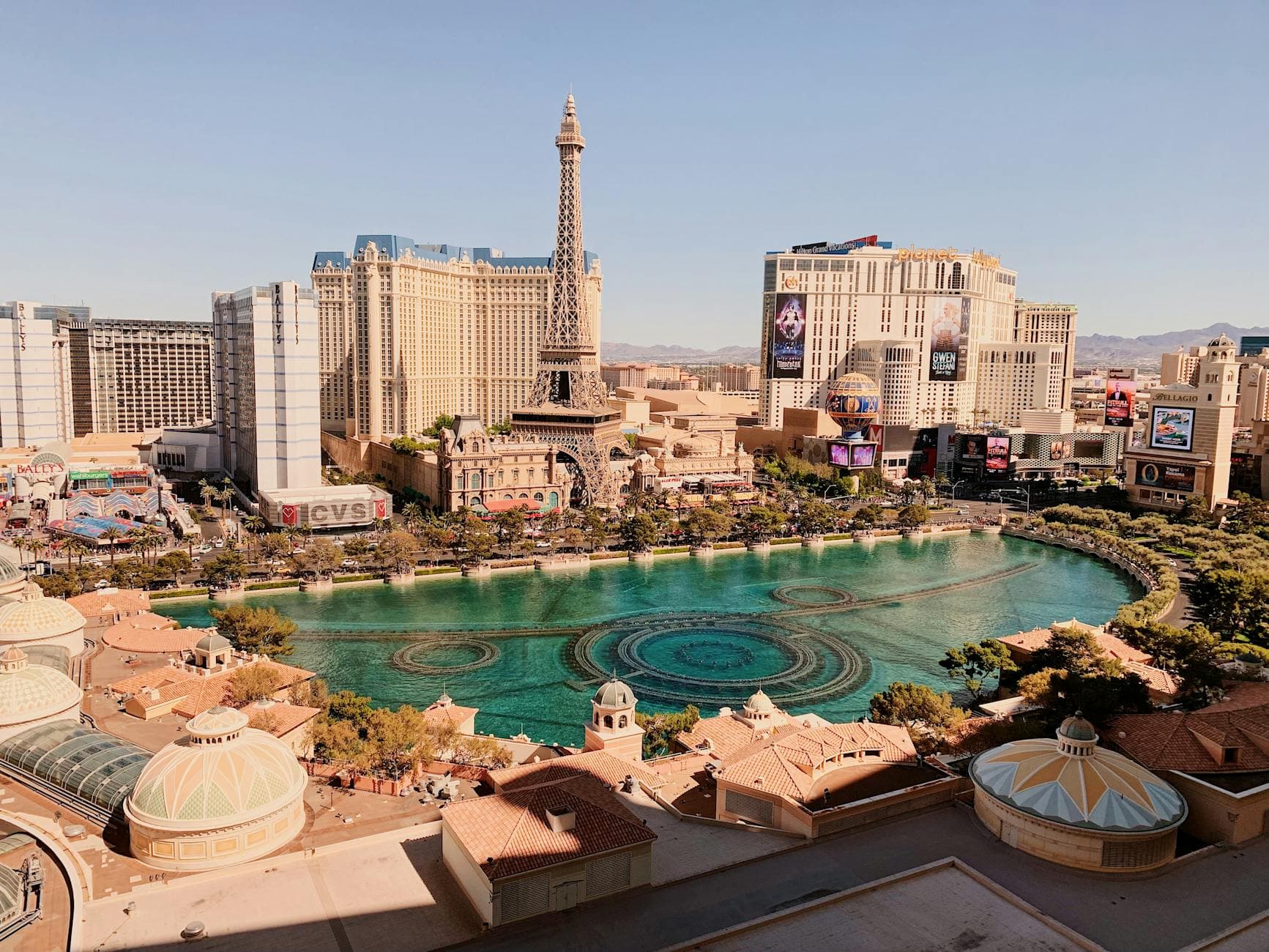 Breathtaking view of Las Vegas Strip with replica Eiffel Tower and vibrant cityscape.