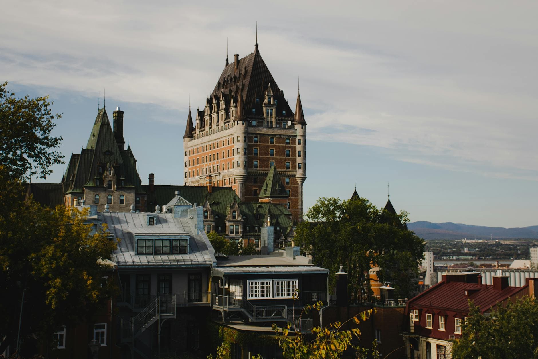 Stunning view of Château Frontenac above historic Québec City under a clear sky.