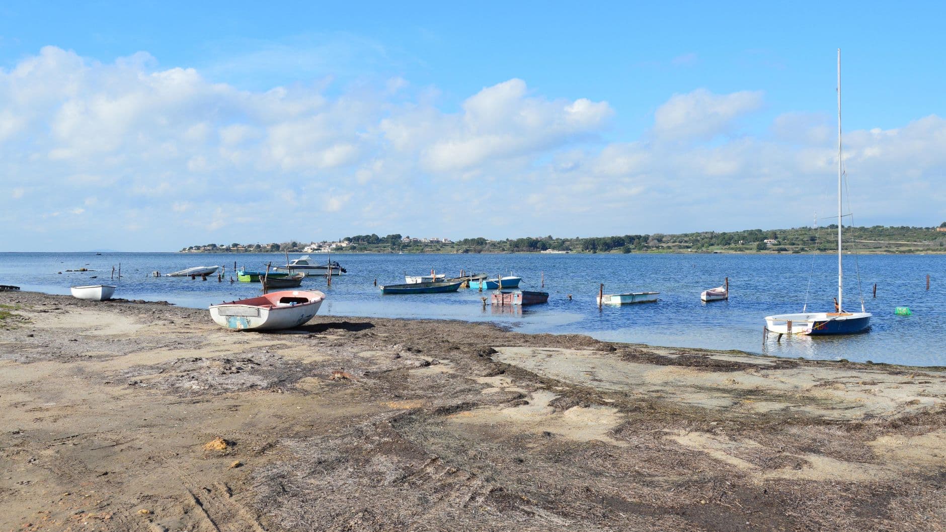 Scenic view of boats anchored on the shore of Étang de Thau in Balaruc-le-Vieux, France.