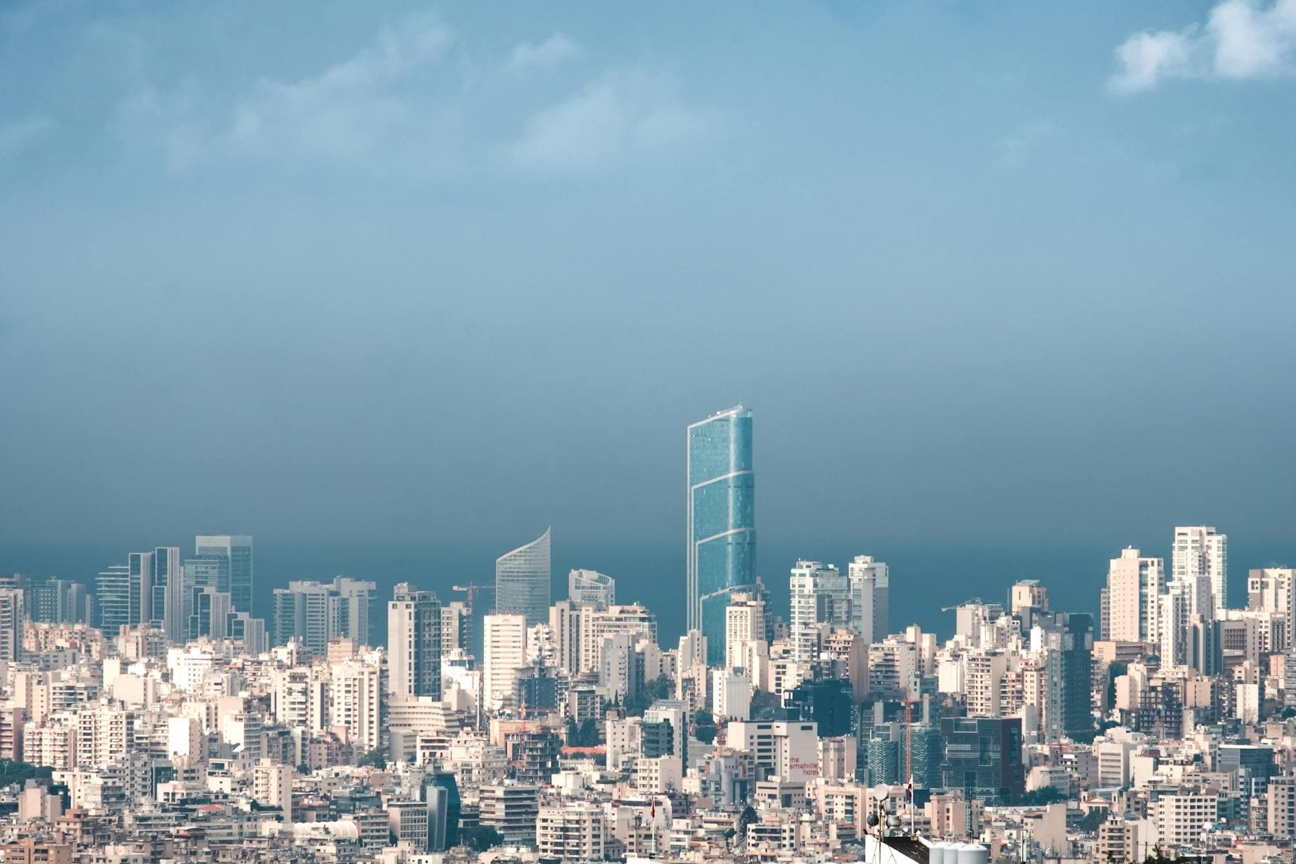 A stunning view of Beirut's contemporary skyline with towering skyscrapers under a clear blue sky.
