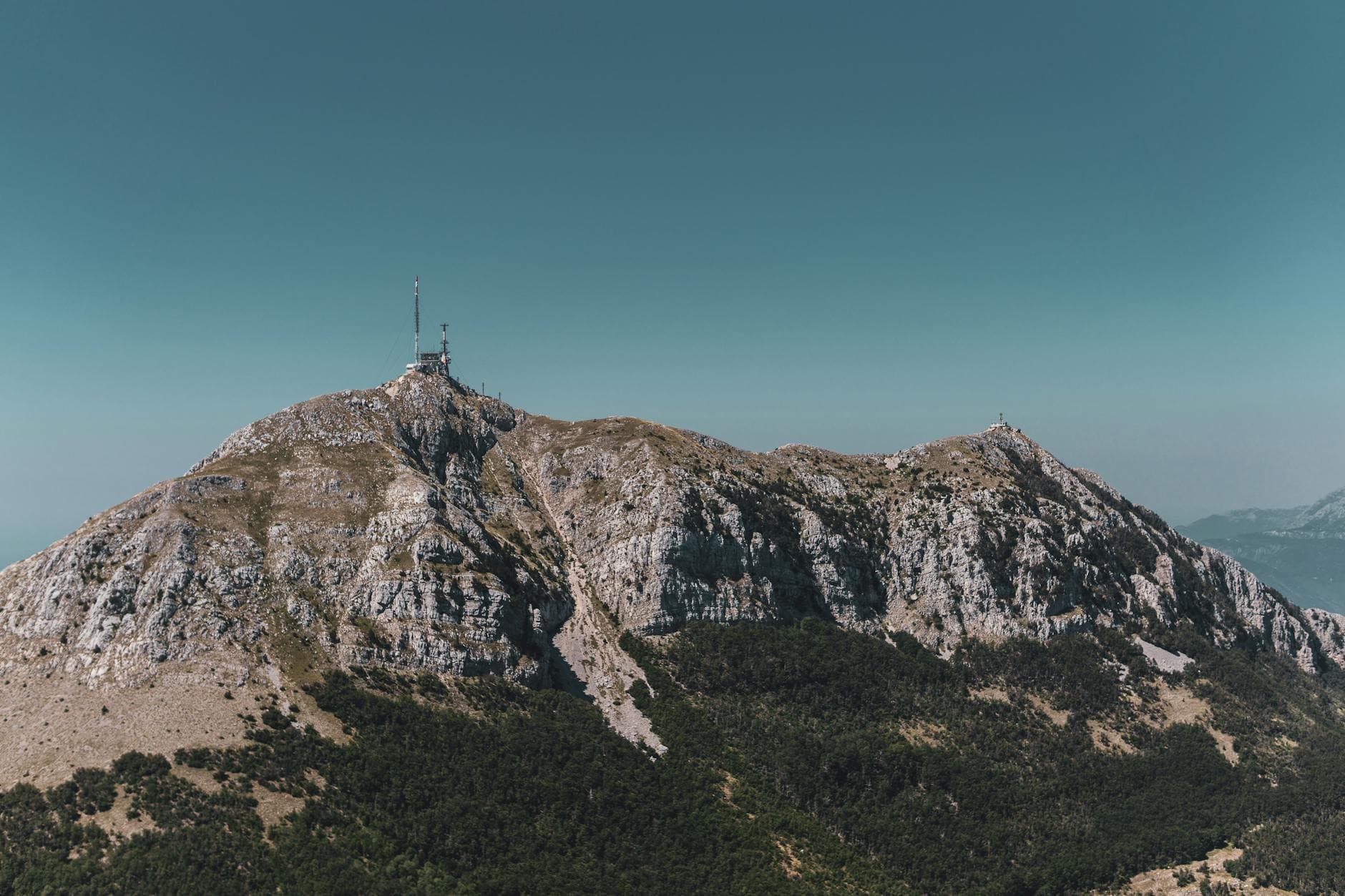 Scenic view of Mount Lovćen in Cetinje, Montenegro under clear skies.
