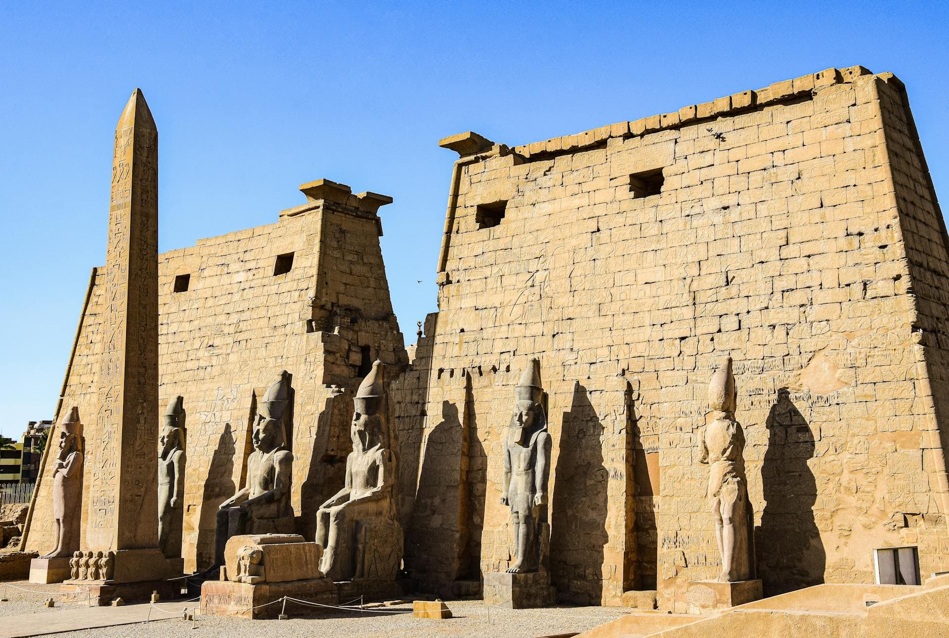 Historic sandstone monuments at Luxor Temple, showcasing ancient Egyptian culture and architecture.