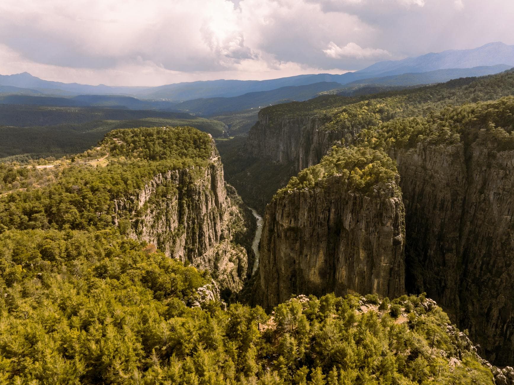 Breathtaking aerial view of Tazi Canyon and surrounding cliffs in Turkey, showcasing natural beauty.
