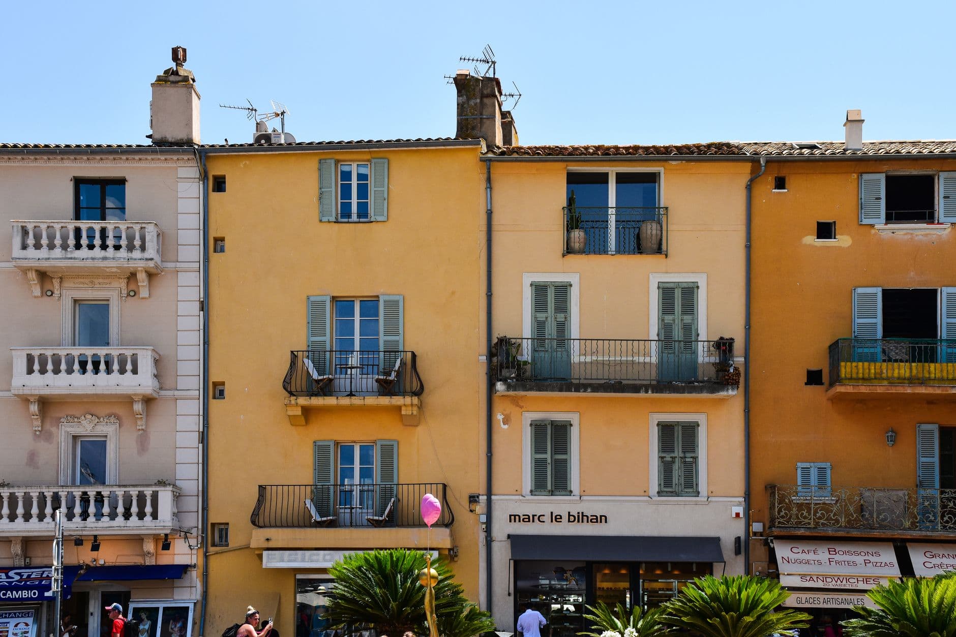 Charming street view of vibrant buildings in Provence-Alpes-Côte d'Azur, France.