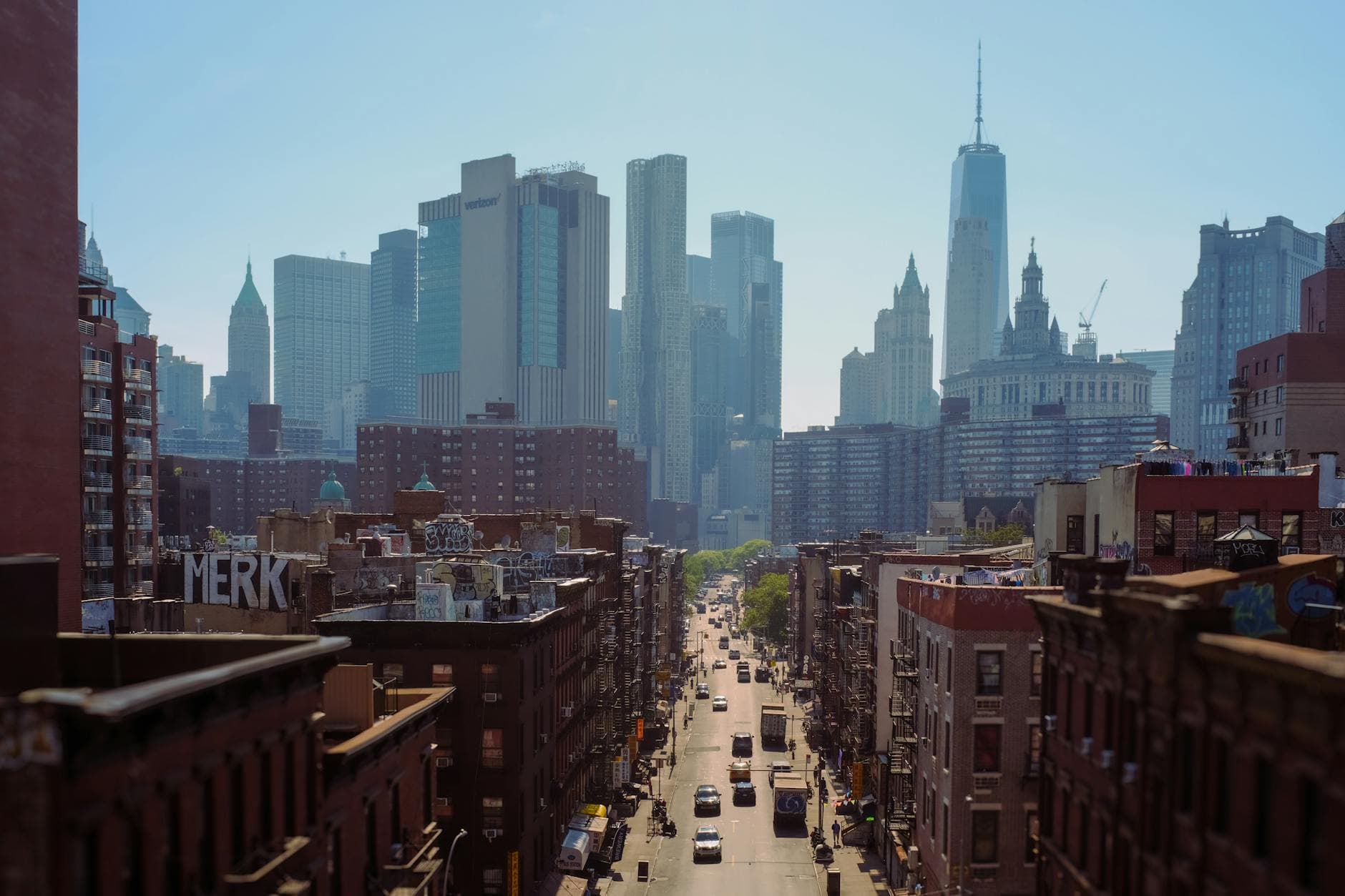 A stunning view of Manhattan showcasing skyscrapers and busy streets on a sunny day.