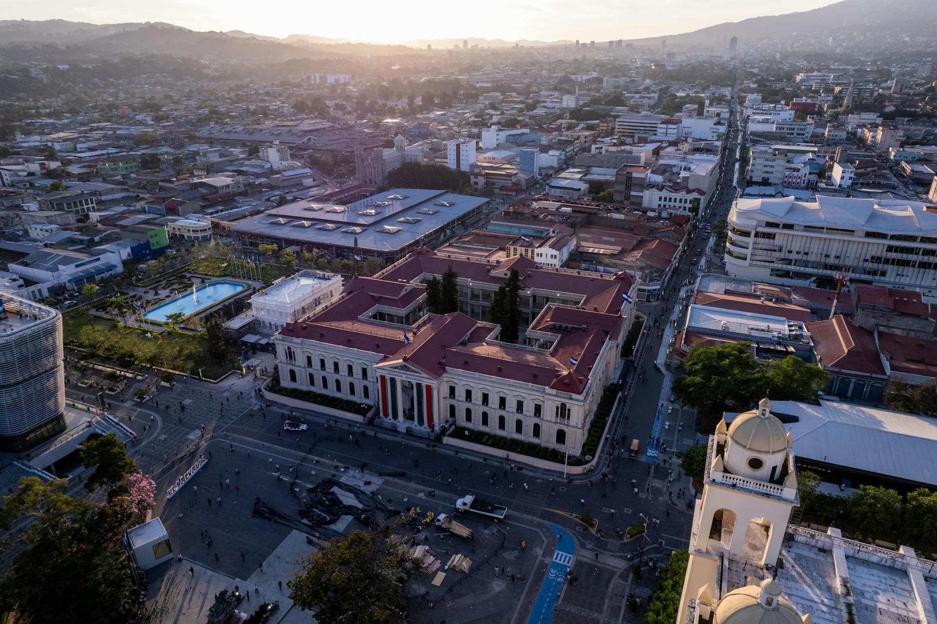 Captivating aerial cityscape of San Salvador, El Salvador during sunset, showcasing historic architecture.
