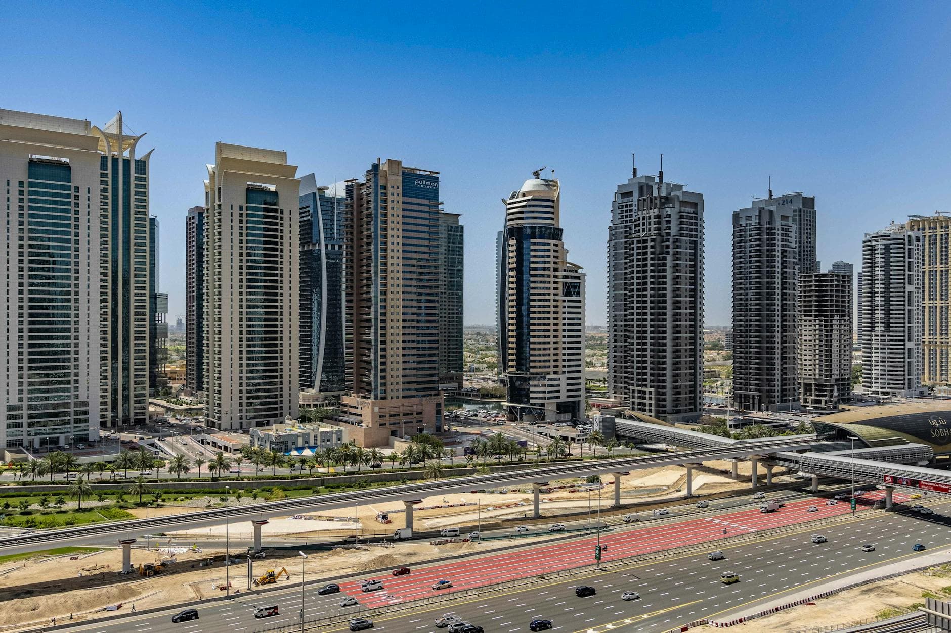 Stunning view of Dubai's futuristic skyscrapers under a clear blue sky.