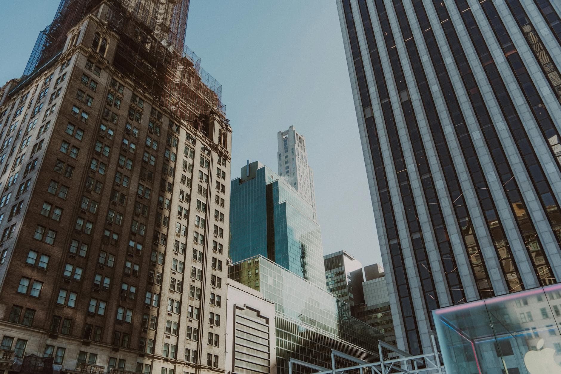 A vibrant view of New York City's iconic skyline in Midtown, featuring towering skyscrapers and modern architecture.