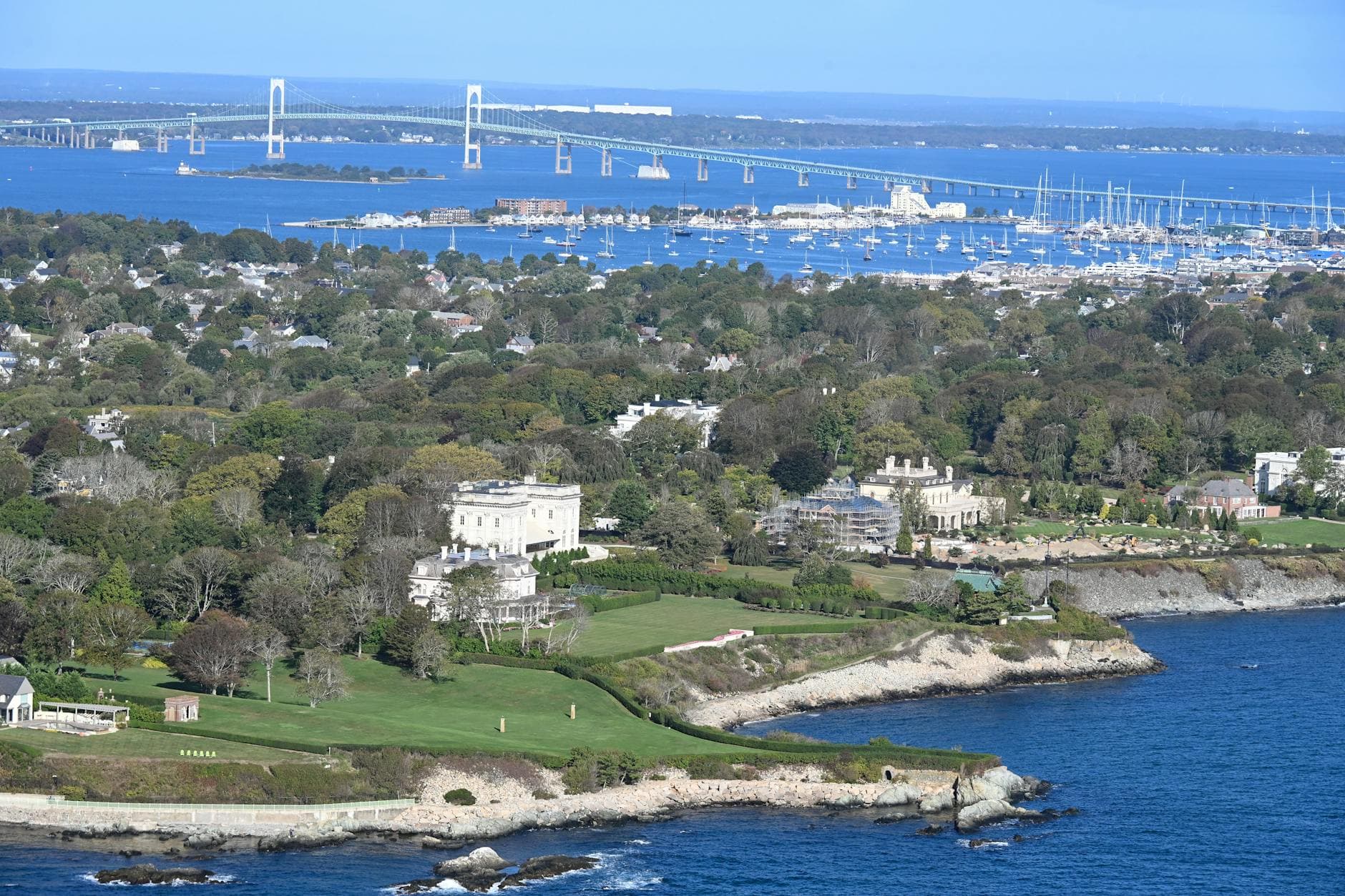Explore the iconic Newport mansions with a stunning view of Narragansett Bay and Claiborne Pell Newport Bridge.