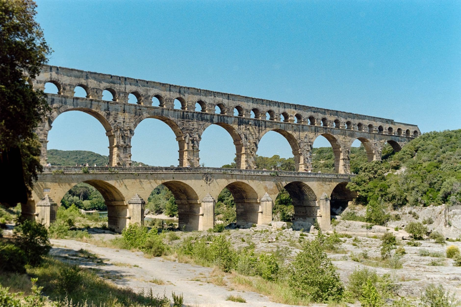View of the Pont du Gard, a historical Roman aqueduct bridge in France.