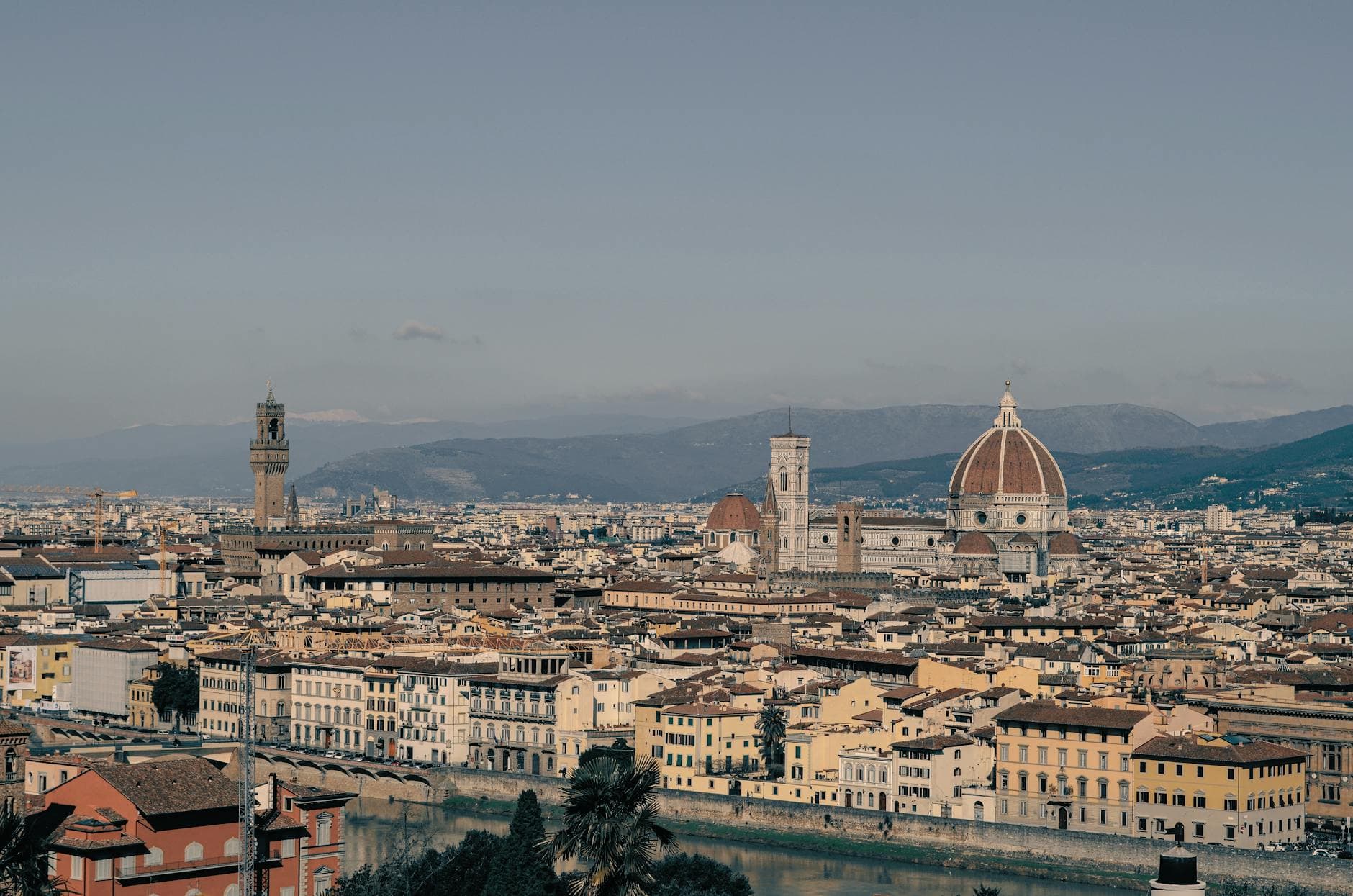 Stunning aerial view of Florence, Italy, showcasing the iconic Duomo Cathedral on a clear day.