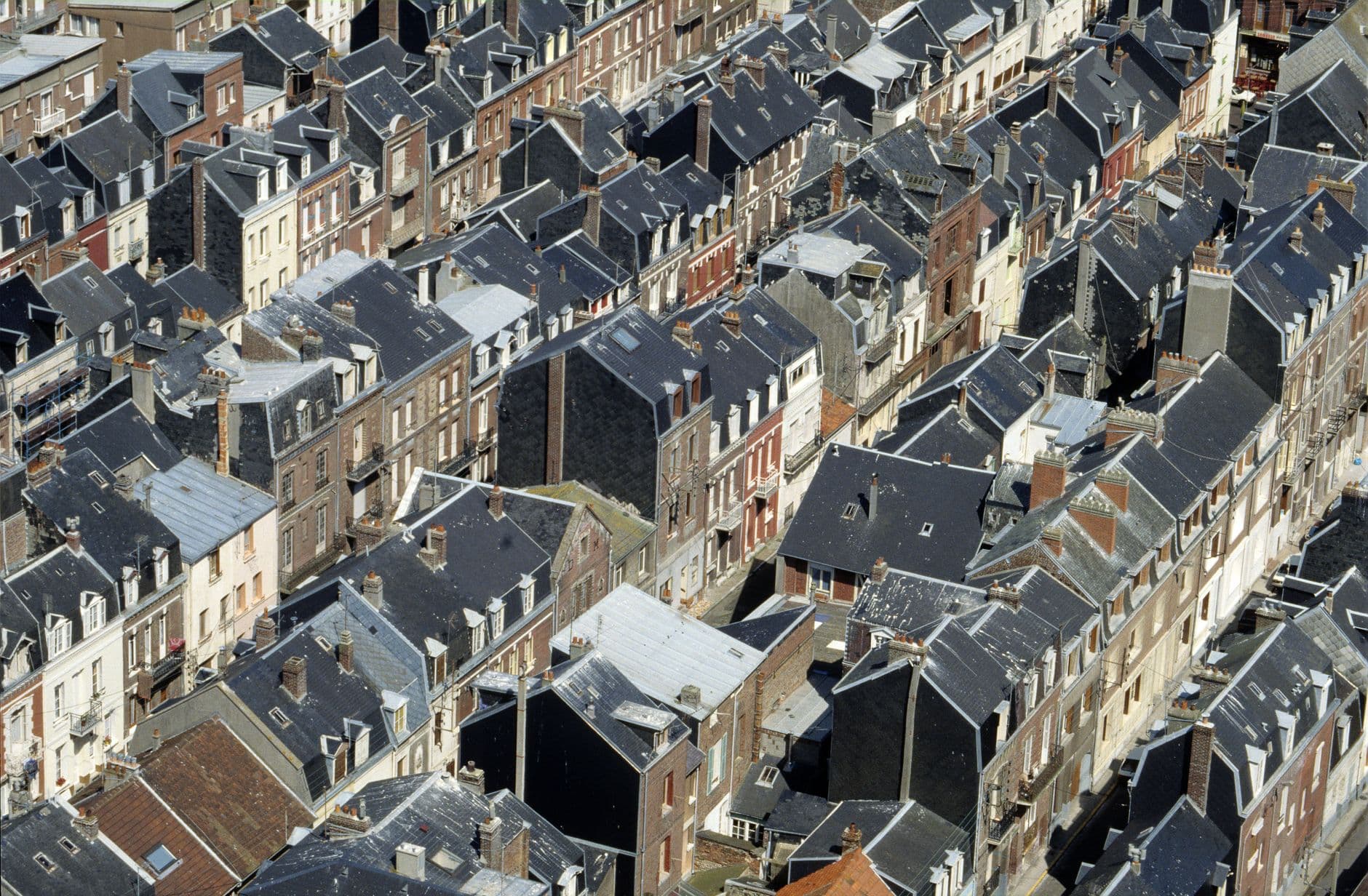 Aerial view showcasing the charming and historic rooftop architecture of Le Tréport, Normandie, France.