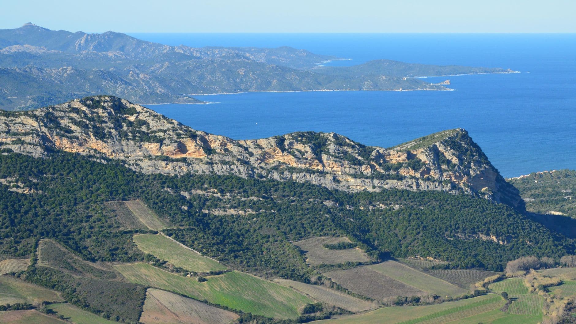 A breathtaking view of mountains and coastline in Saint-Florent, Corsica, France.