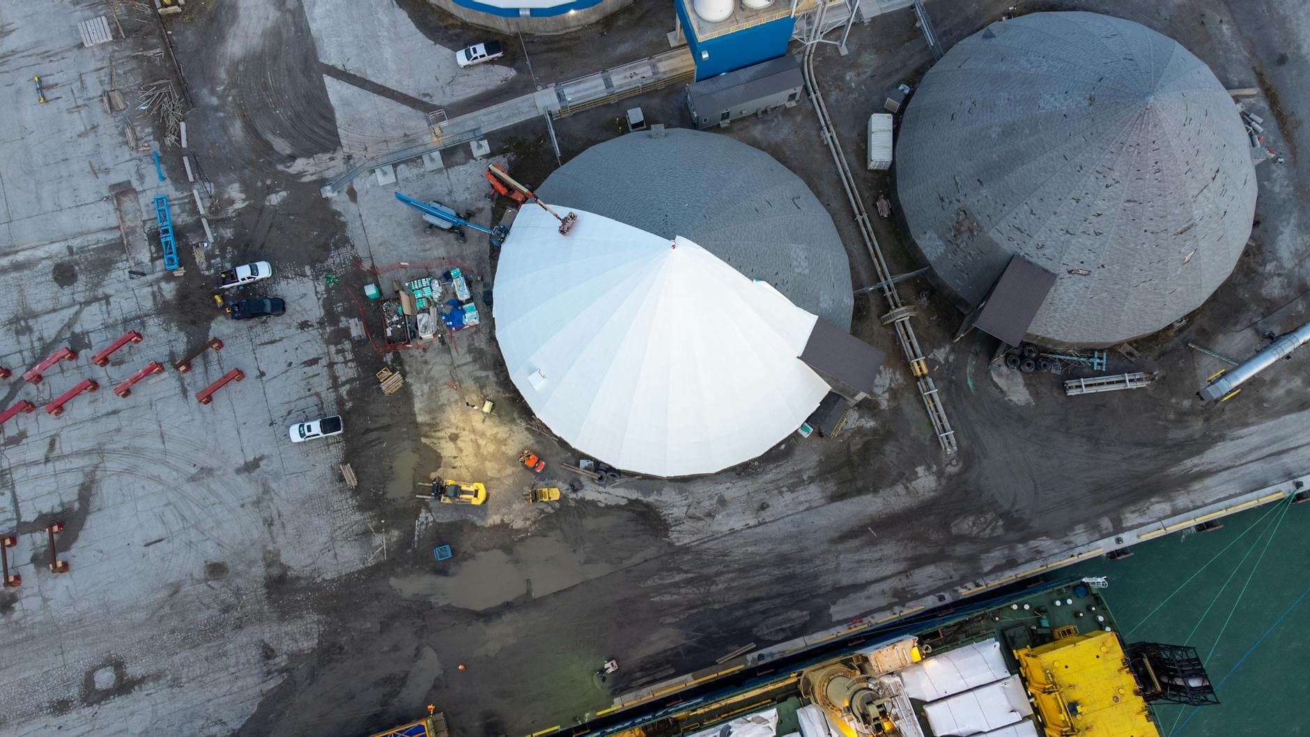 Aerial shot of industrial port facilities and structures in Oshawa, Canada.