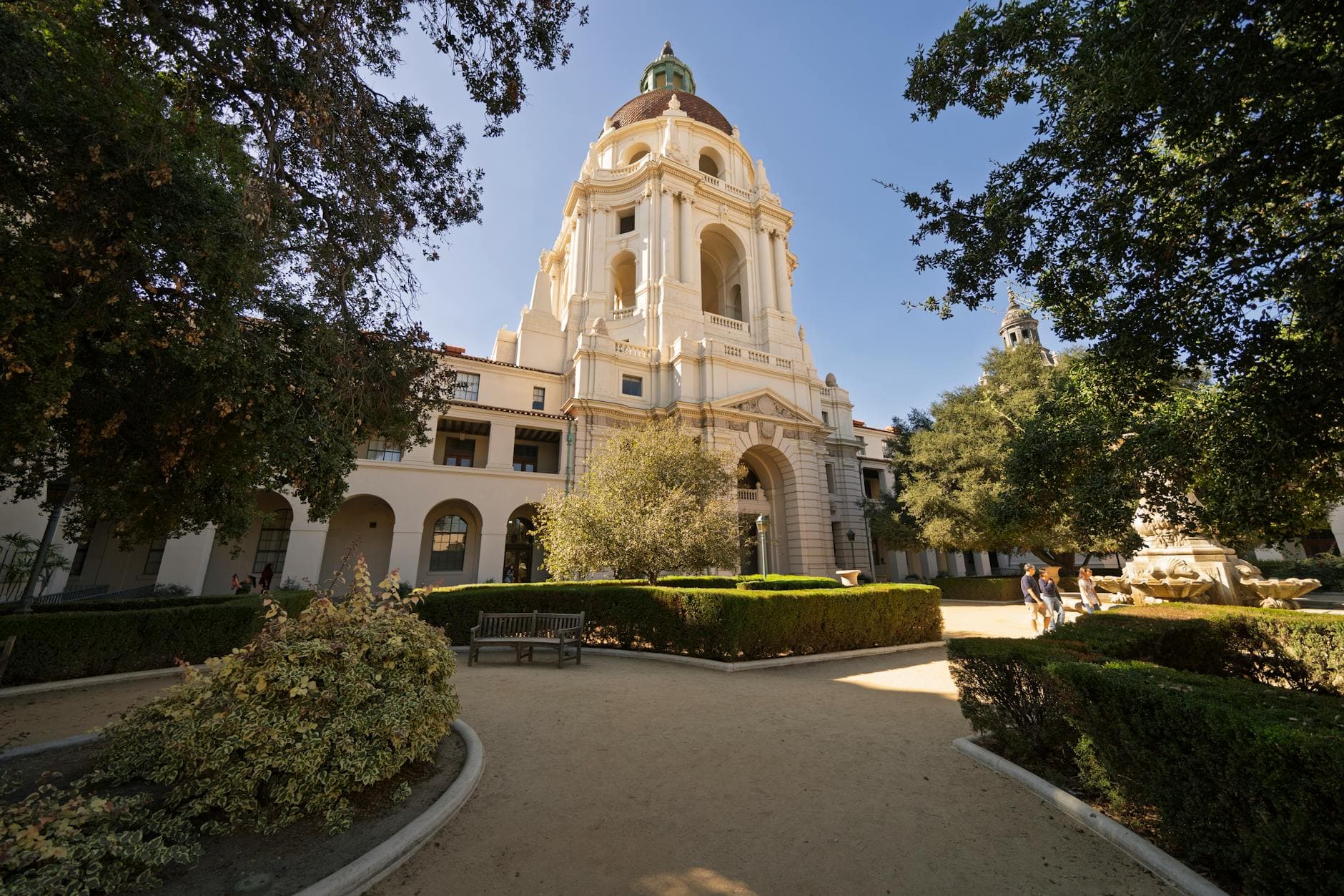 Elegant view of Pasadena City Hall with lush gardens on a sunny day.