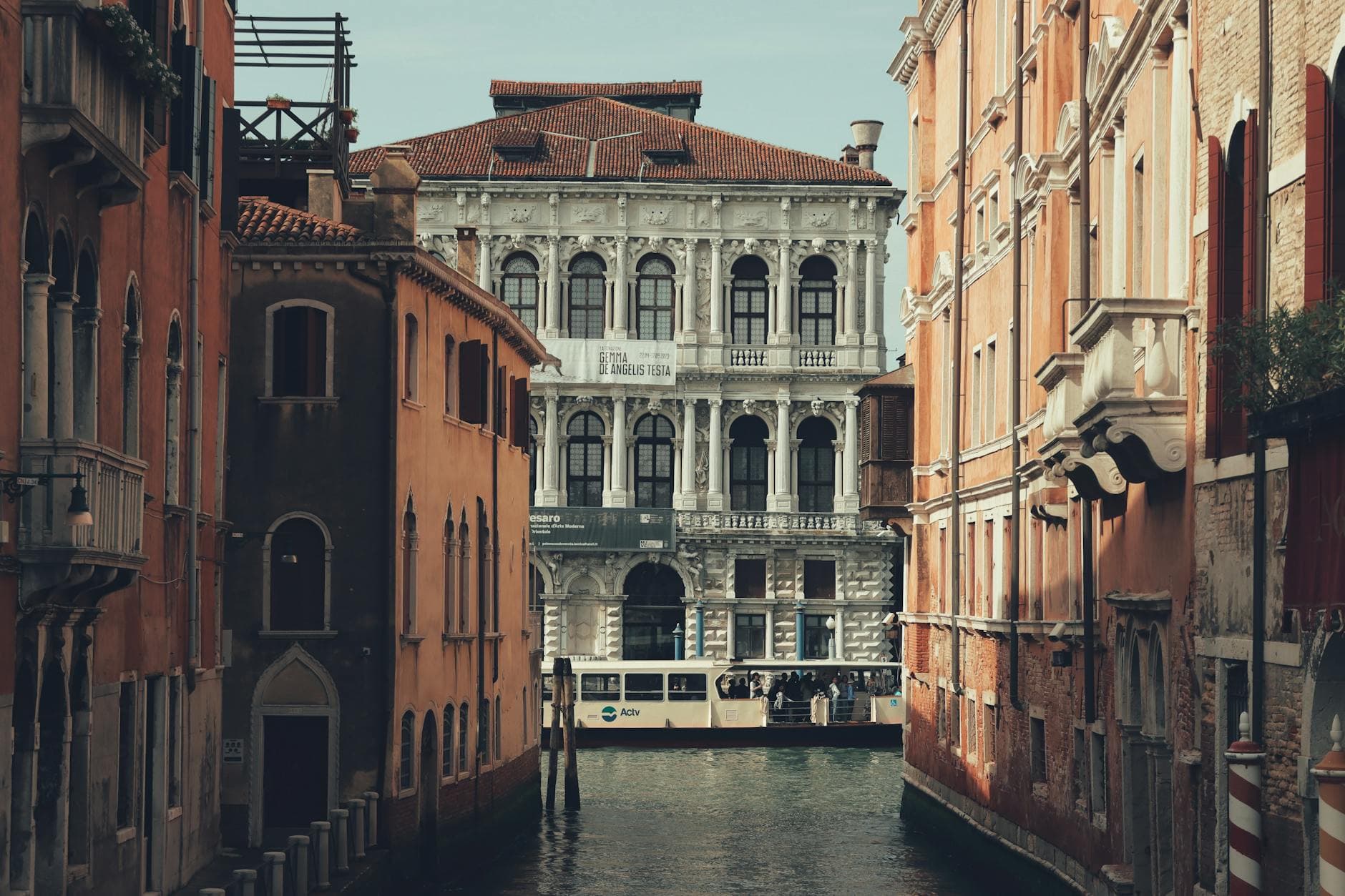 Captivating view of a canal in Venice, featuring historic architecture and a tranquil atmosphere.