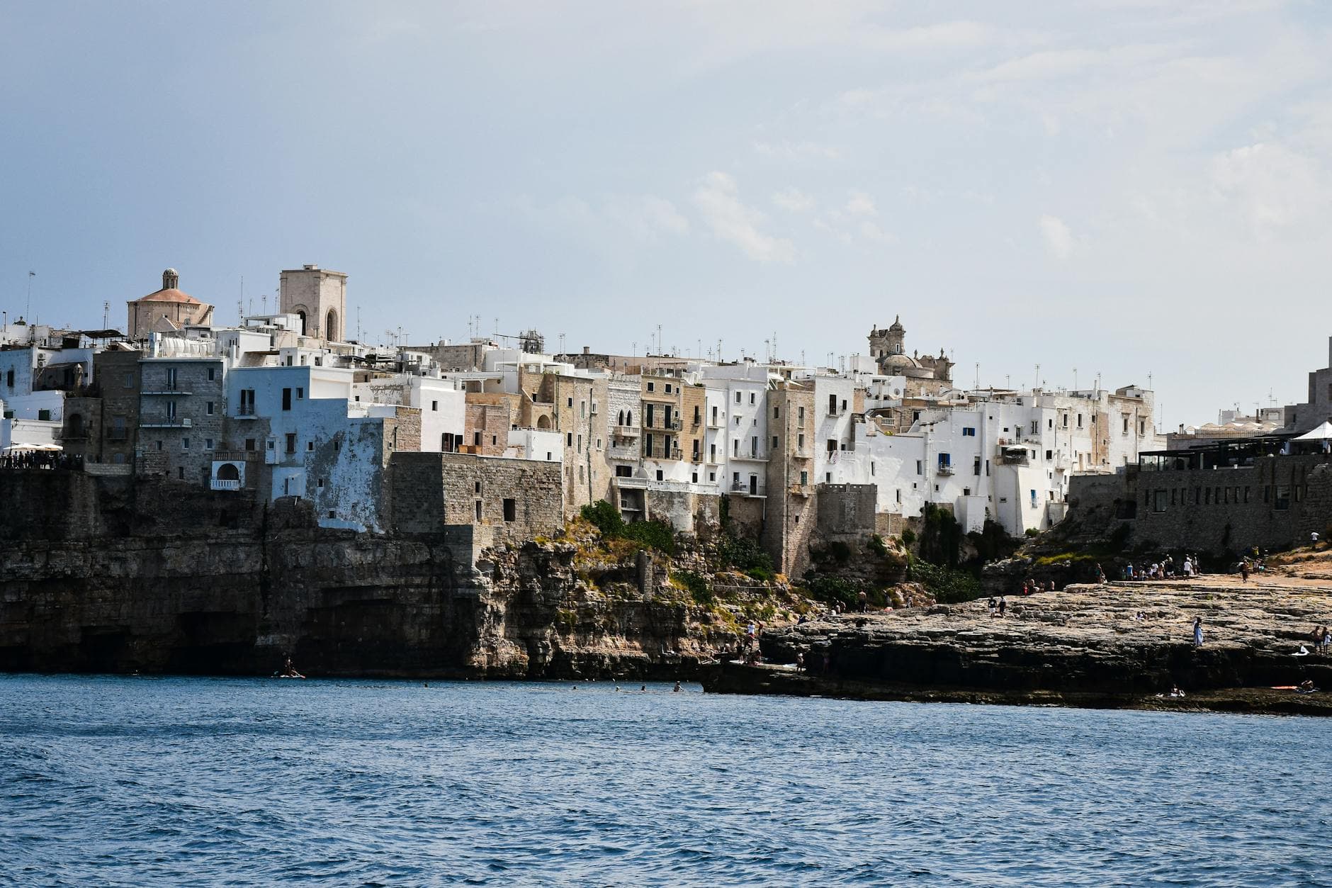 Historic coastal architecture of Polignano a Mare, Apulia in Italy, viewed from the sea.