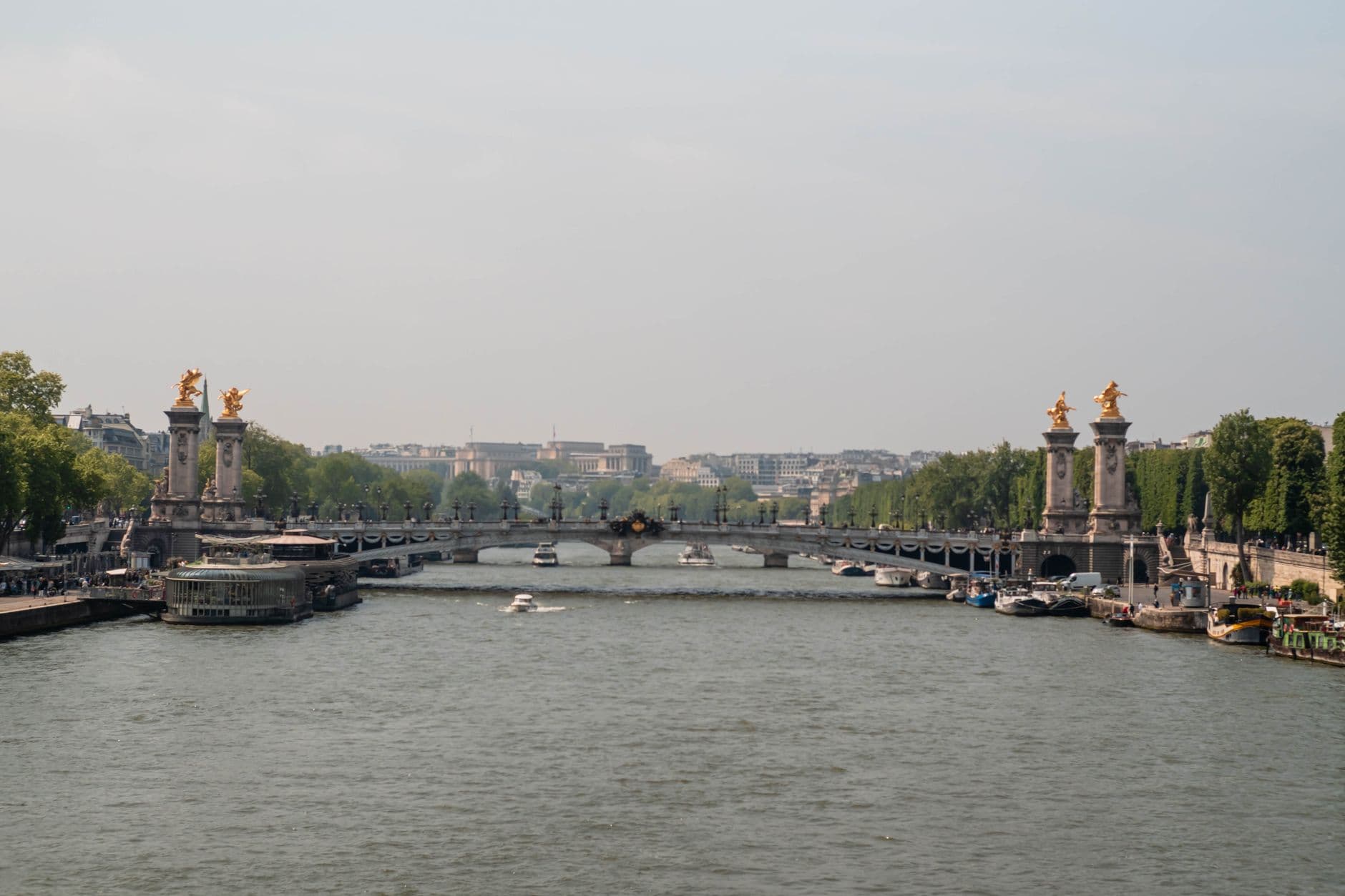 View of Pont Alexandre III bridge and Seine River in Paris, France.