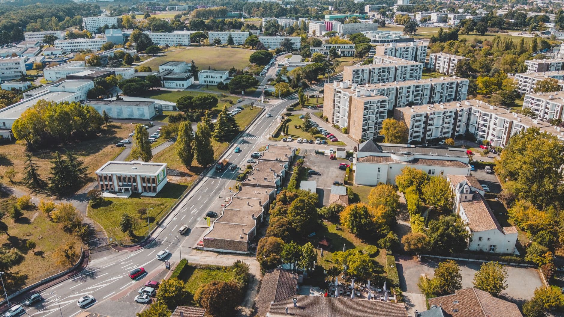 Aerial view of suburban streets and buildings in Bordeaux, France showcasing urban planning.