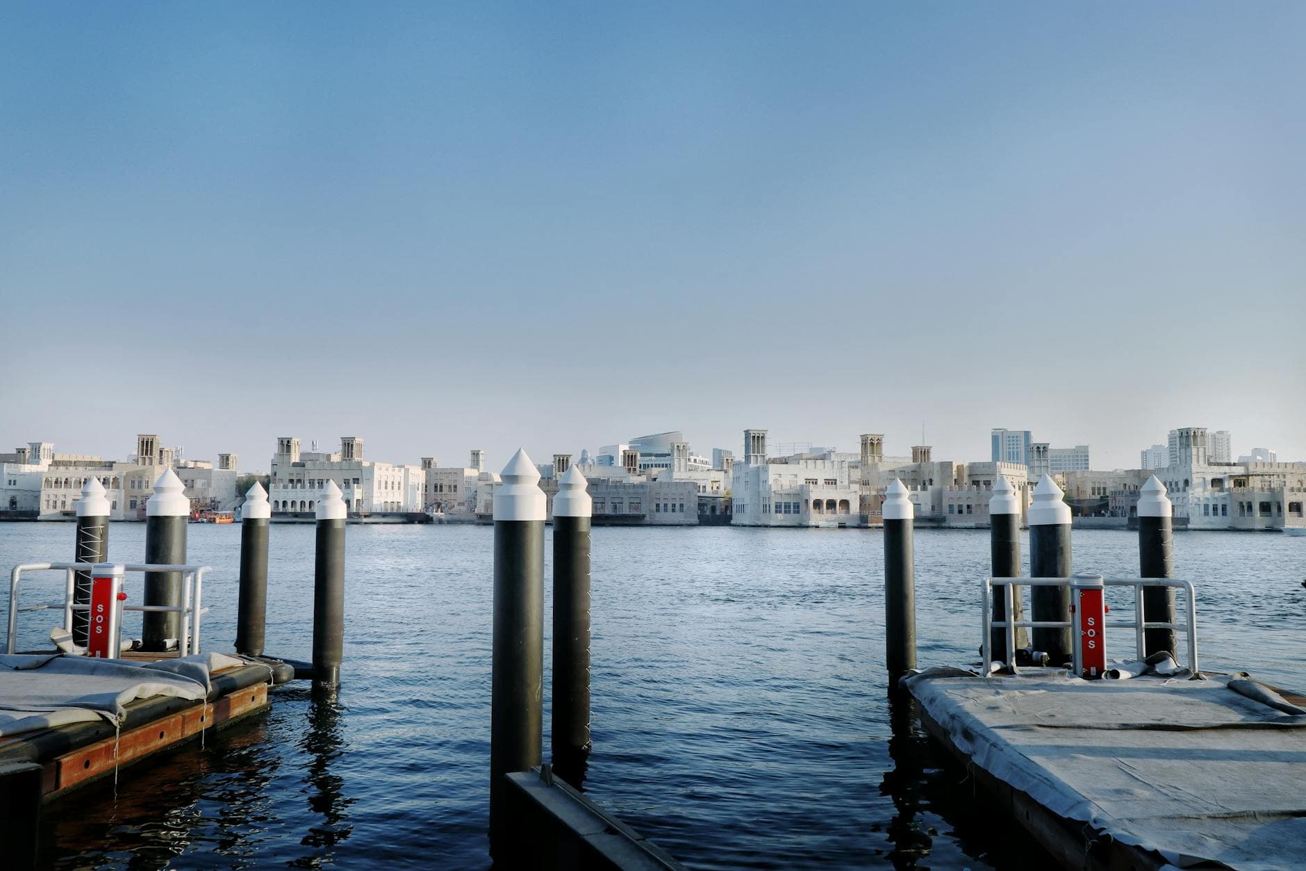 View of Dubai Marina's iconic architecture and waterfront on a clear day.