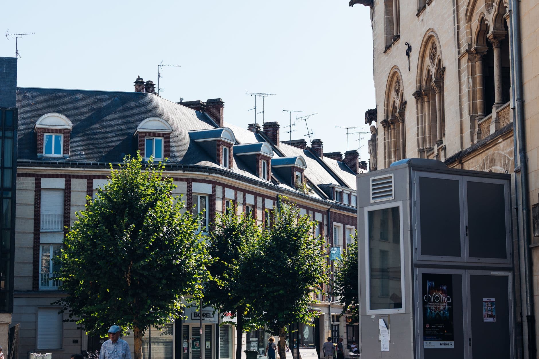 Picturesque streetscape in Amiens, France, showcasing classic European architecture.