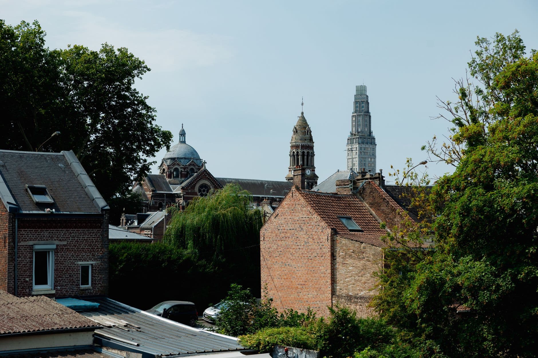 Historic skyline view of Amiens, featuring iconic towers and classic European architecture.