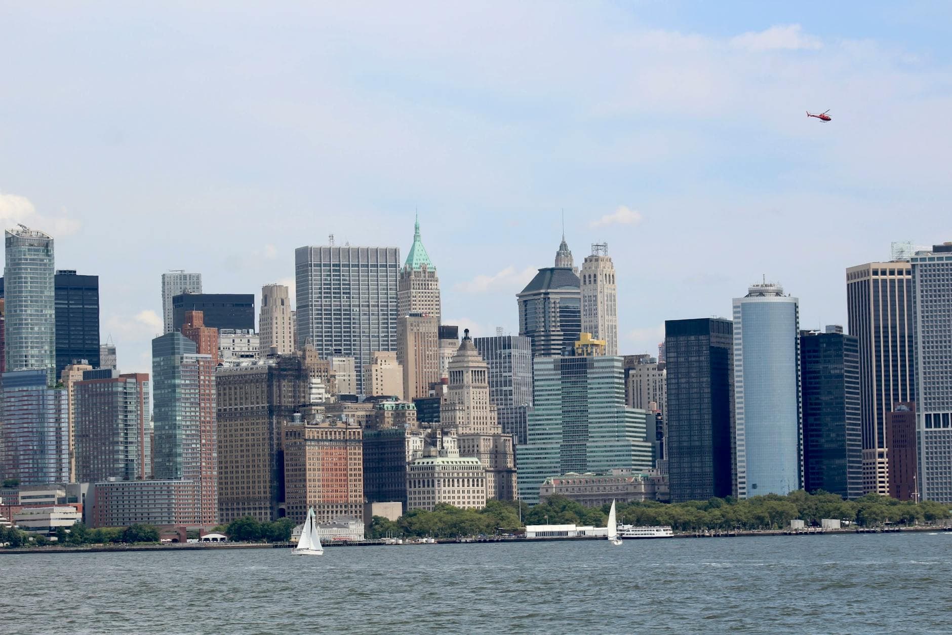 Stunning view of Lower Manhattan skyline with contemporary skyscrapers across the waterfront.