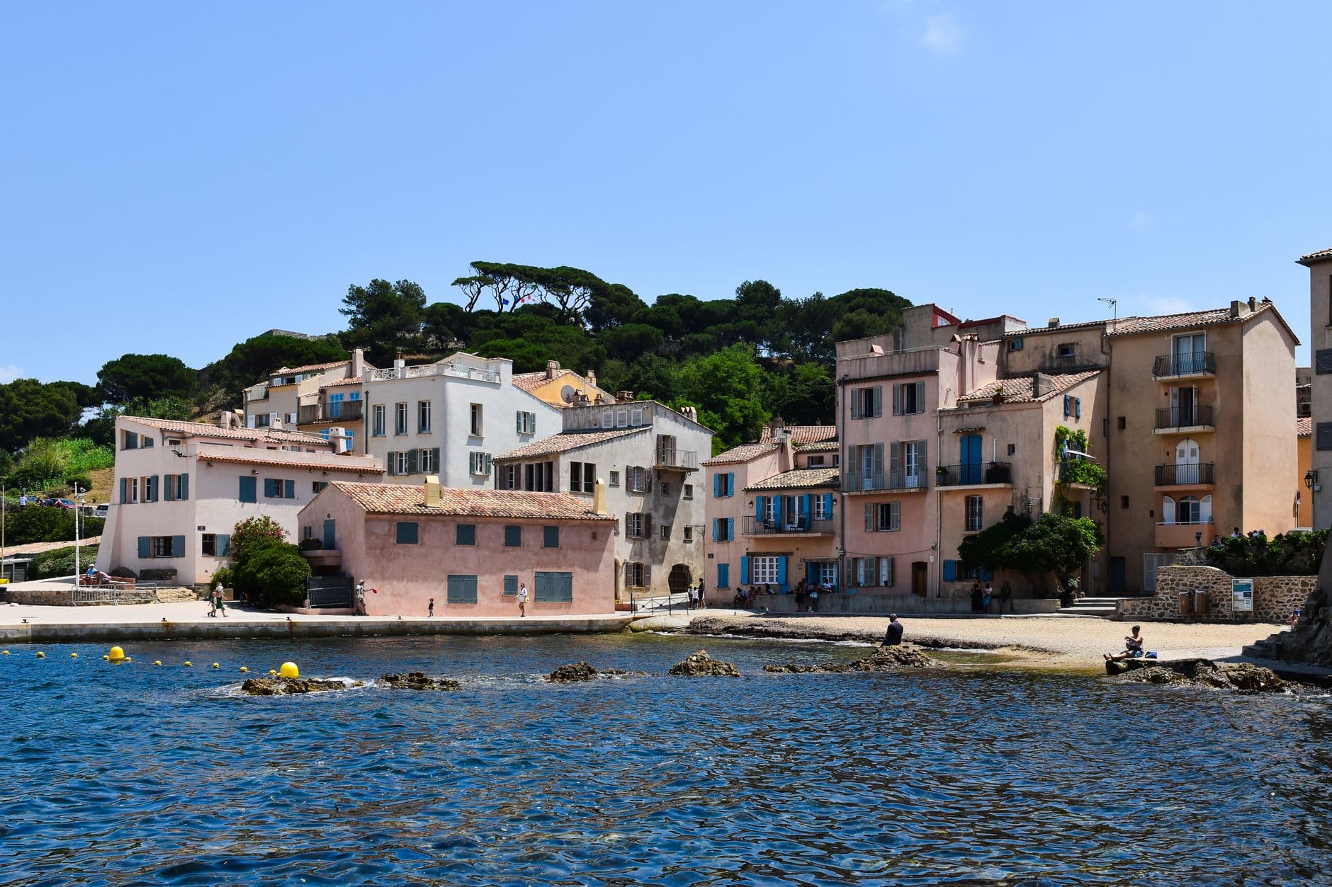 Scenic view of a picturesque village along the French Riviera's coastline.
