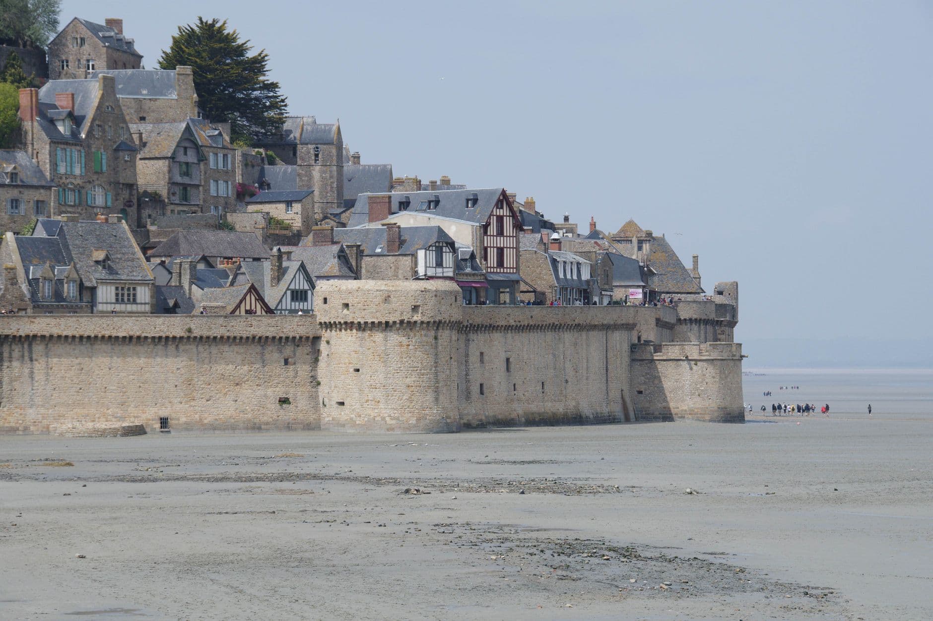 Scenic view of Mont Saint-Michel's medieval architecture, showcasing historical French heritage.