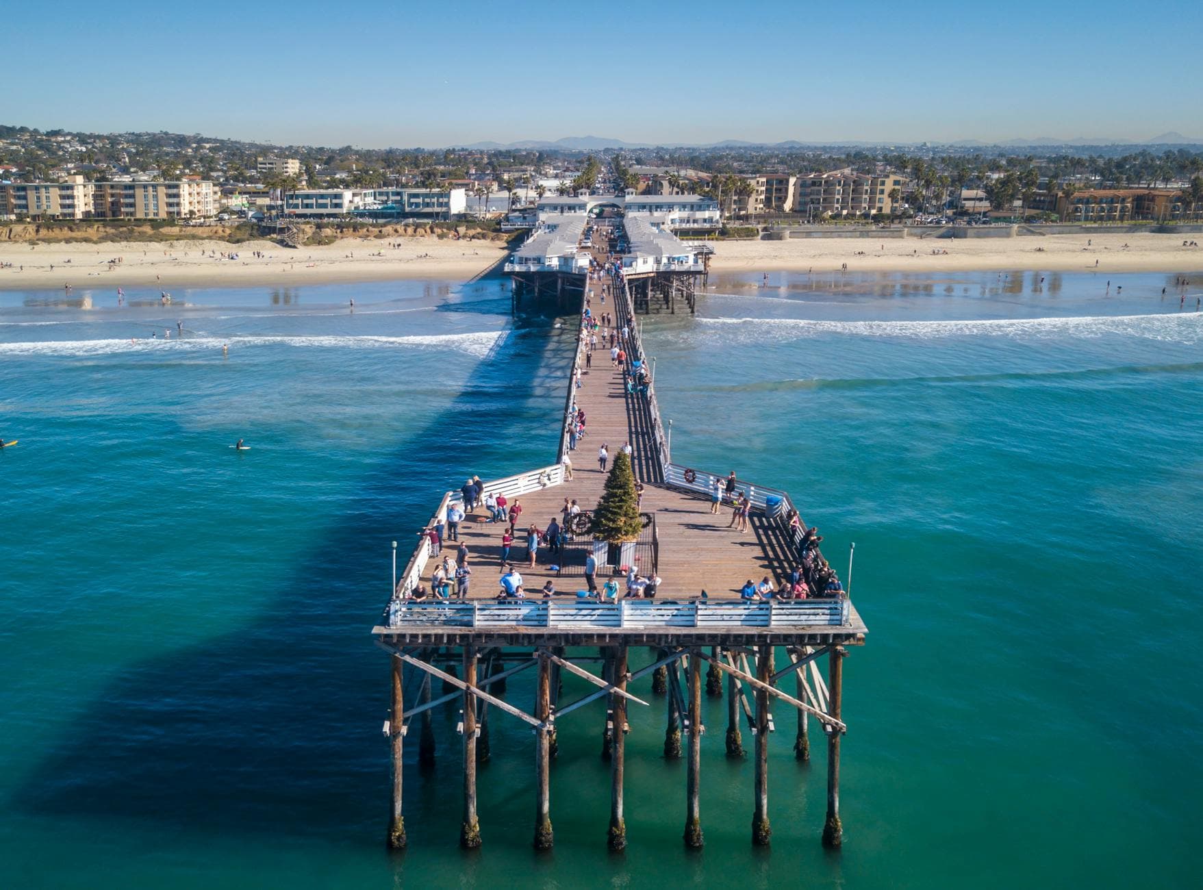 Stunning aerial photo of Crystal Pier in San Diego, showcasing the beach and ocean views.