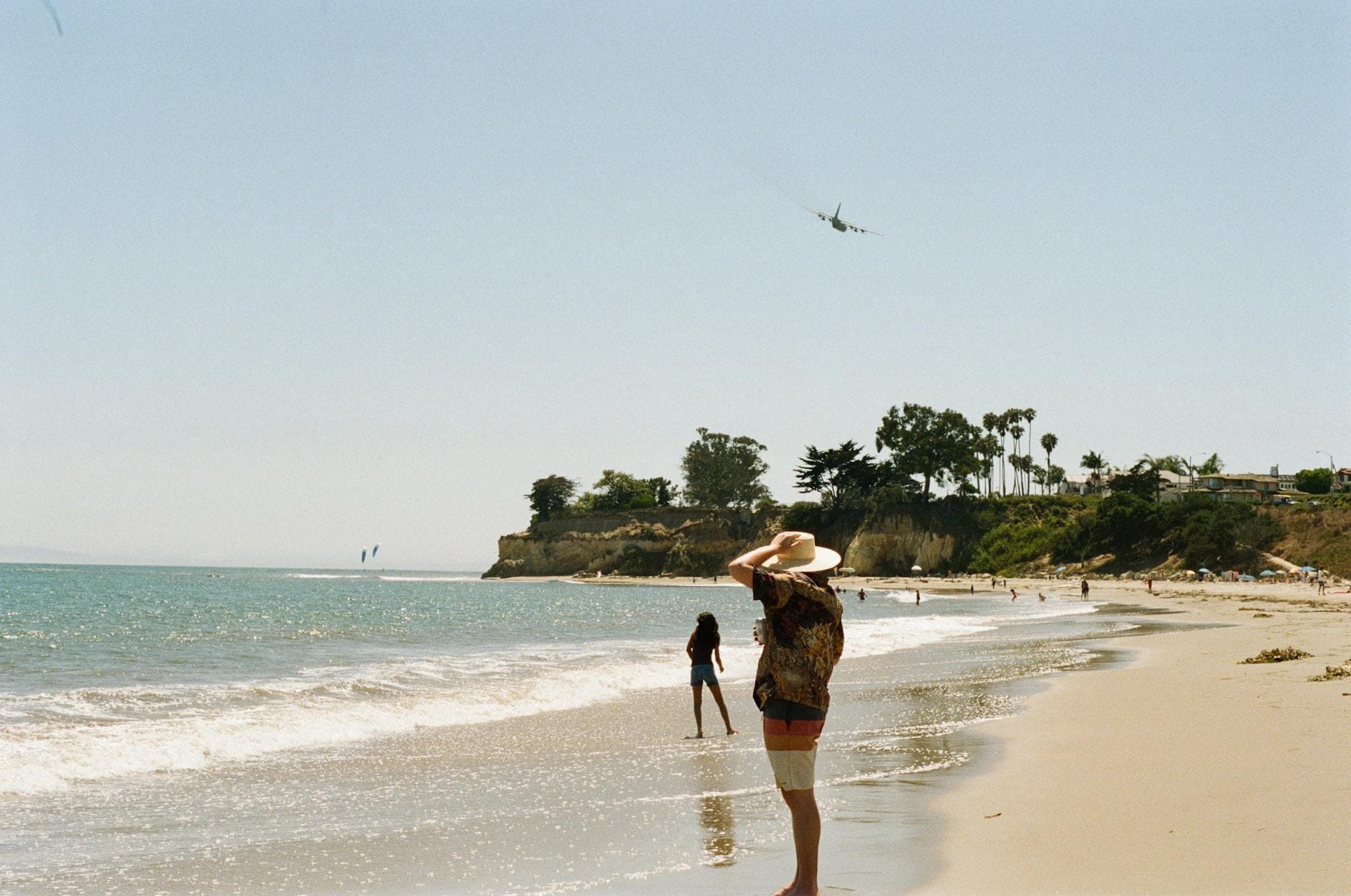Relaxing day at Santa Barbara beach with people enjoying the ocean view.
