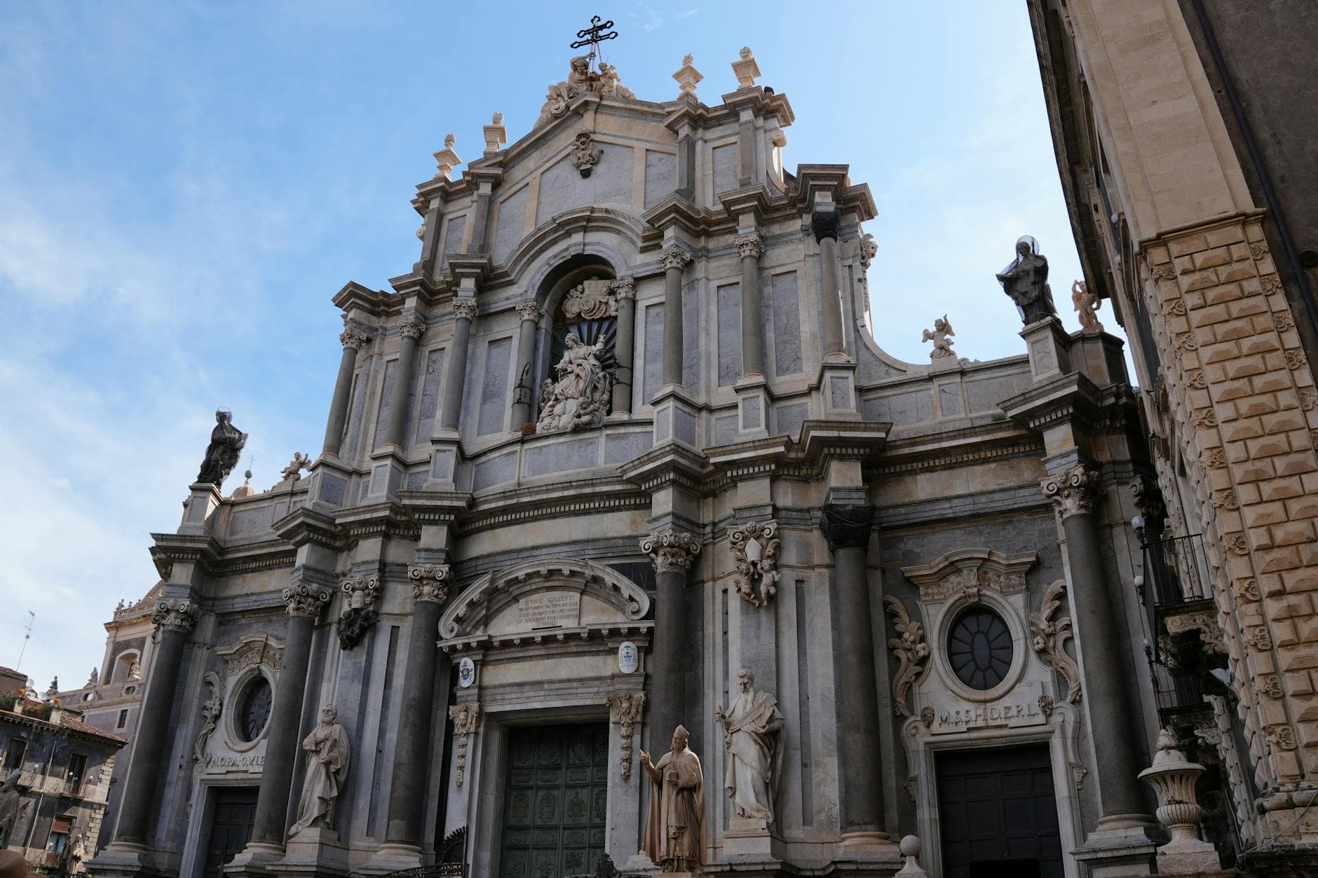Stunning view of the ornate Baroque architecture of Catania Cathedral, Sicily, Italy.