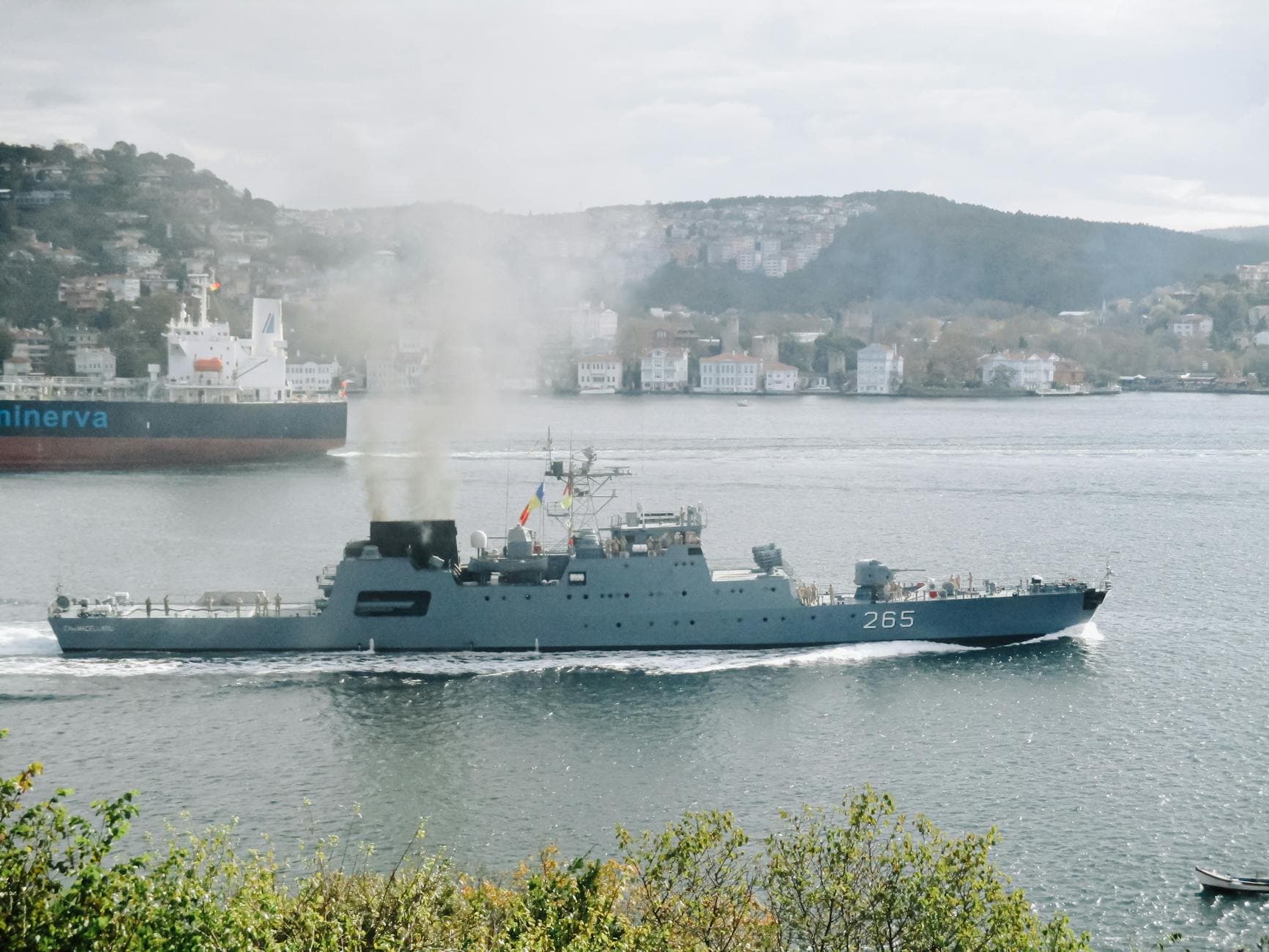Navy warship cruising through the Bosphorus in Istanbul, Turkey, near Sarıyer.