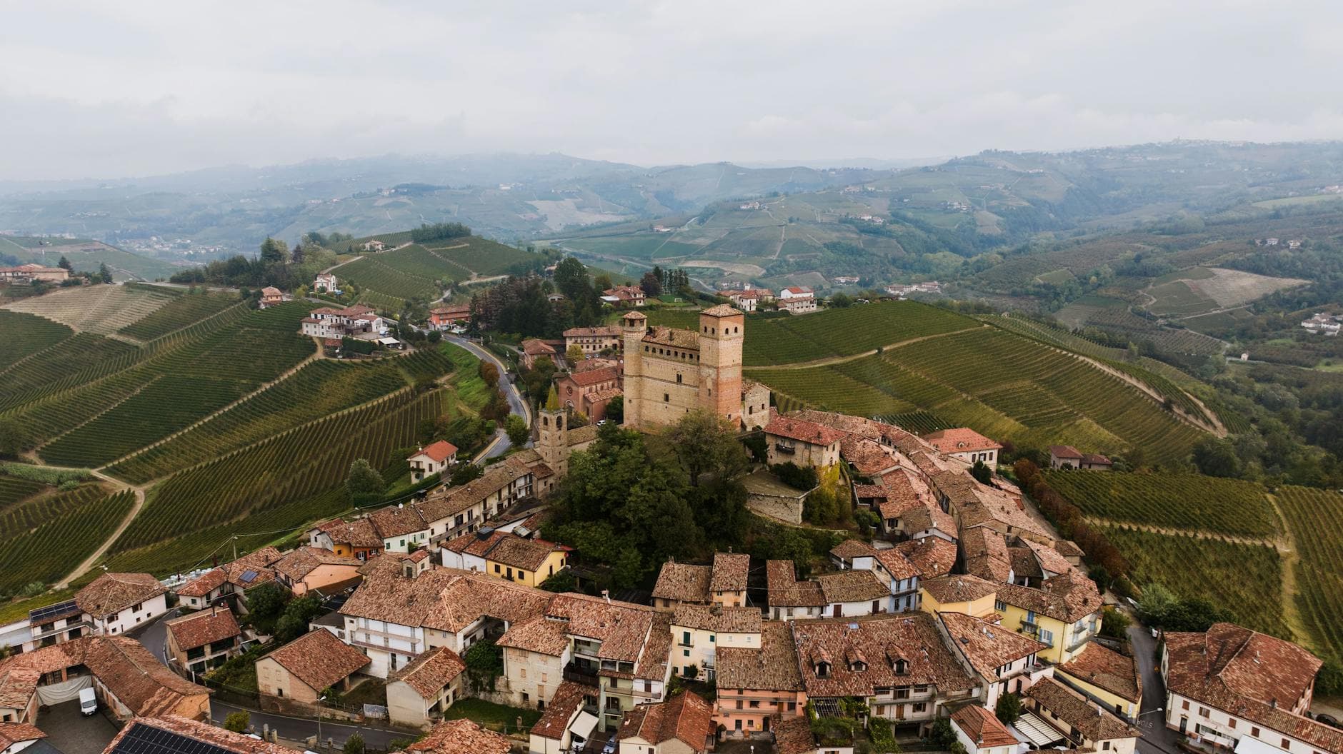 Scenic aerial view of the medieval town and vineyards in Serralunga d'Alba, Piemonte, Italy.