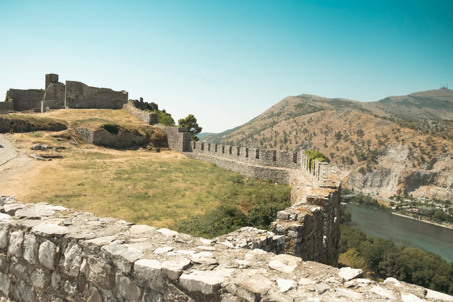 View of the historic Rozafa Castle overlooking the landscape of Shkodër, Albania.