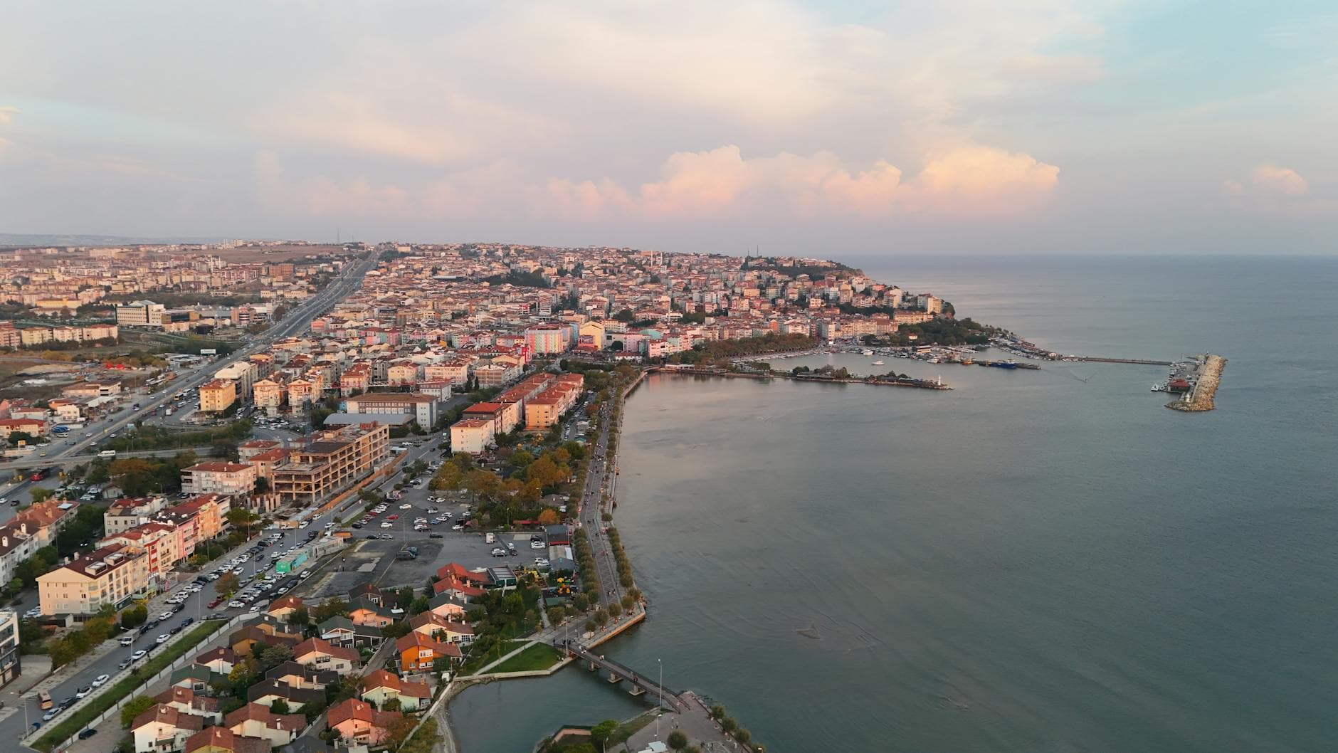 Captivating aerial view of Silivri, İstanbul during sunrise showcasing the coast and urban landscape.