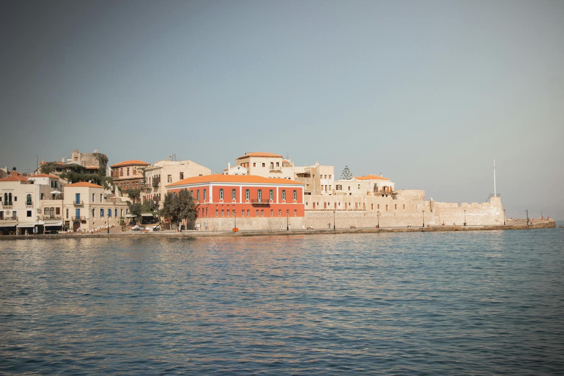 Scenic view of Chania's historic waterfront and architecture in Crete, Greece.